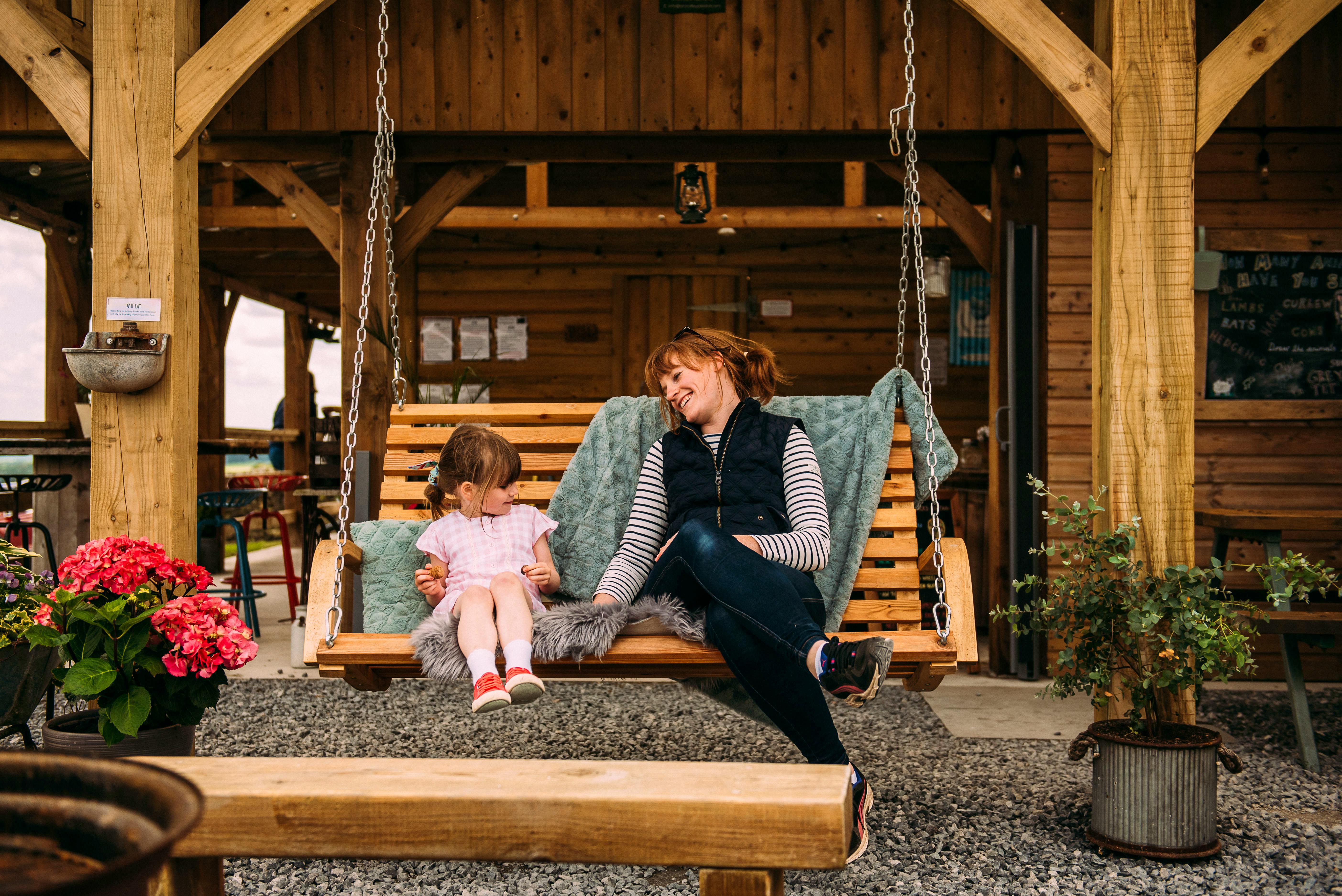 Wooden swing seat at The Hub