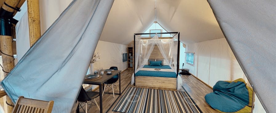 Lakeside Glamping Petzen - Glamping tent for couples, bedroom and living room (photo is symbolic)