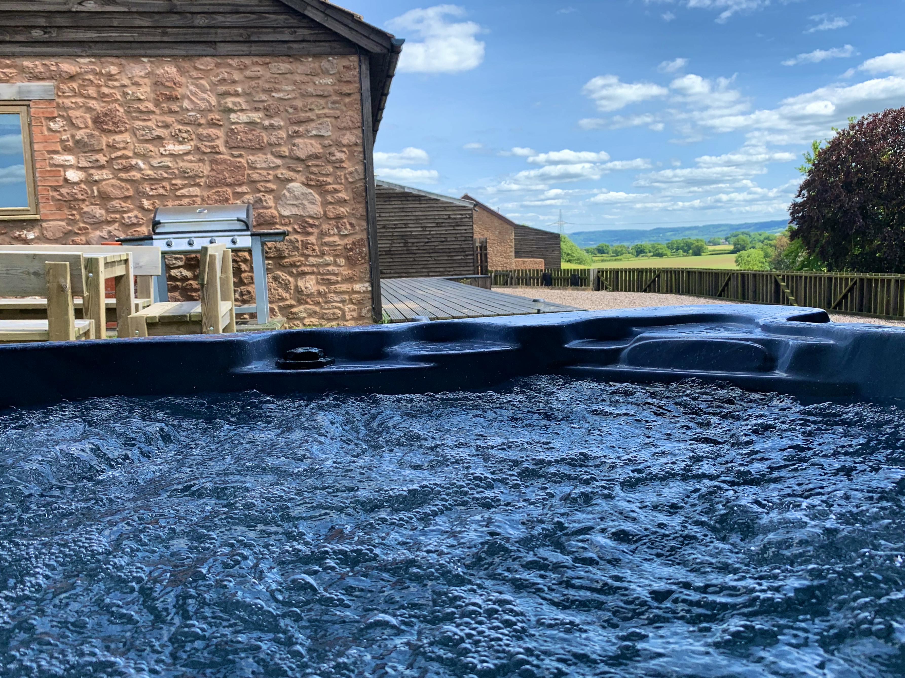 Hot tub and BBQ area
