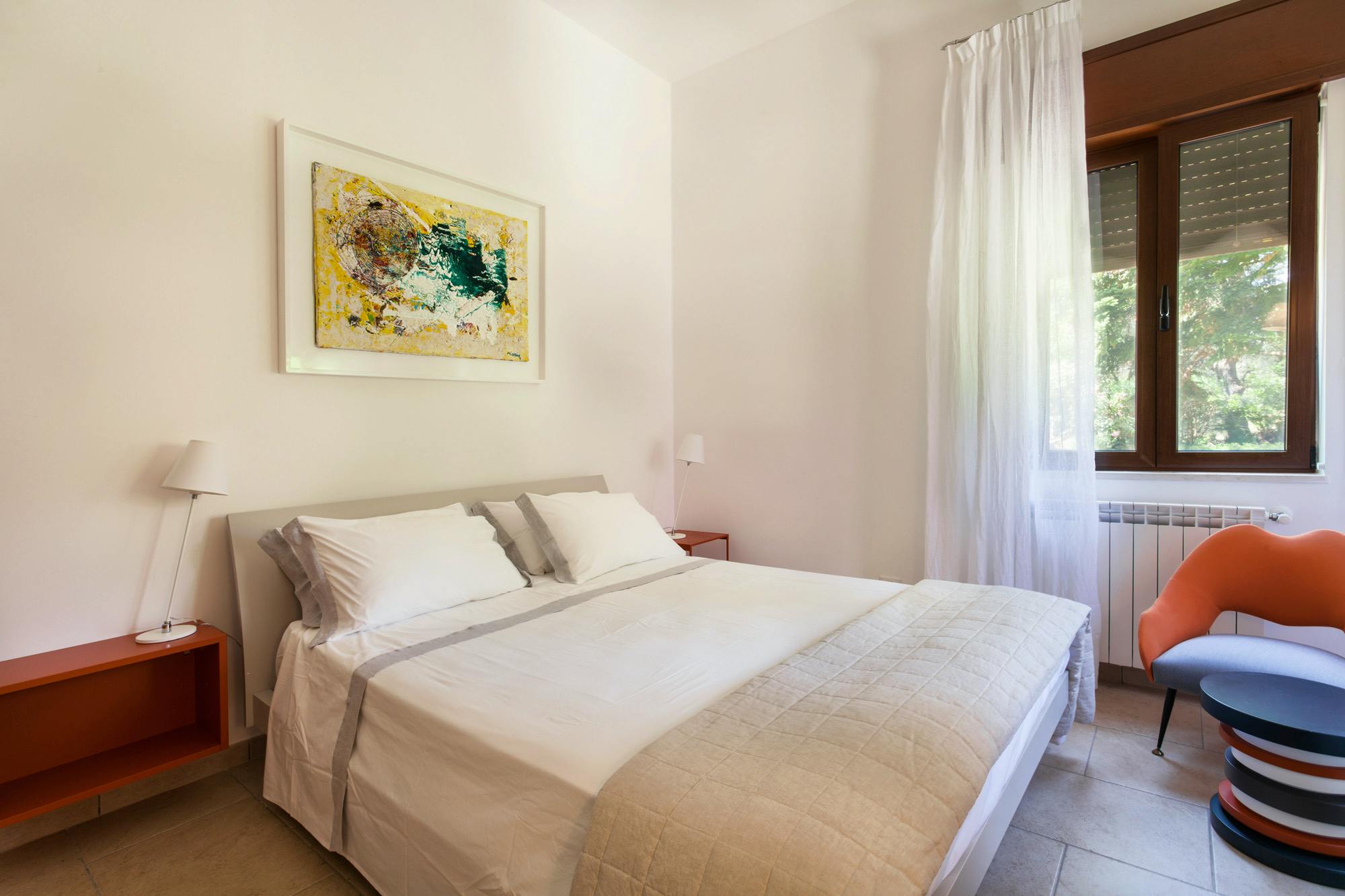 Newly refurbished double bedroom with original artwork and designer furniture