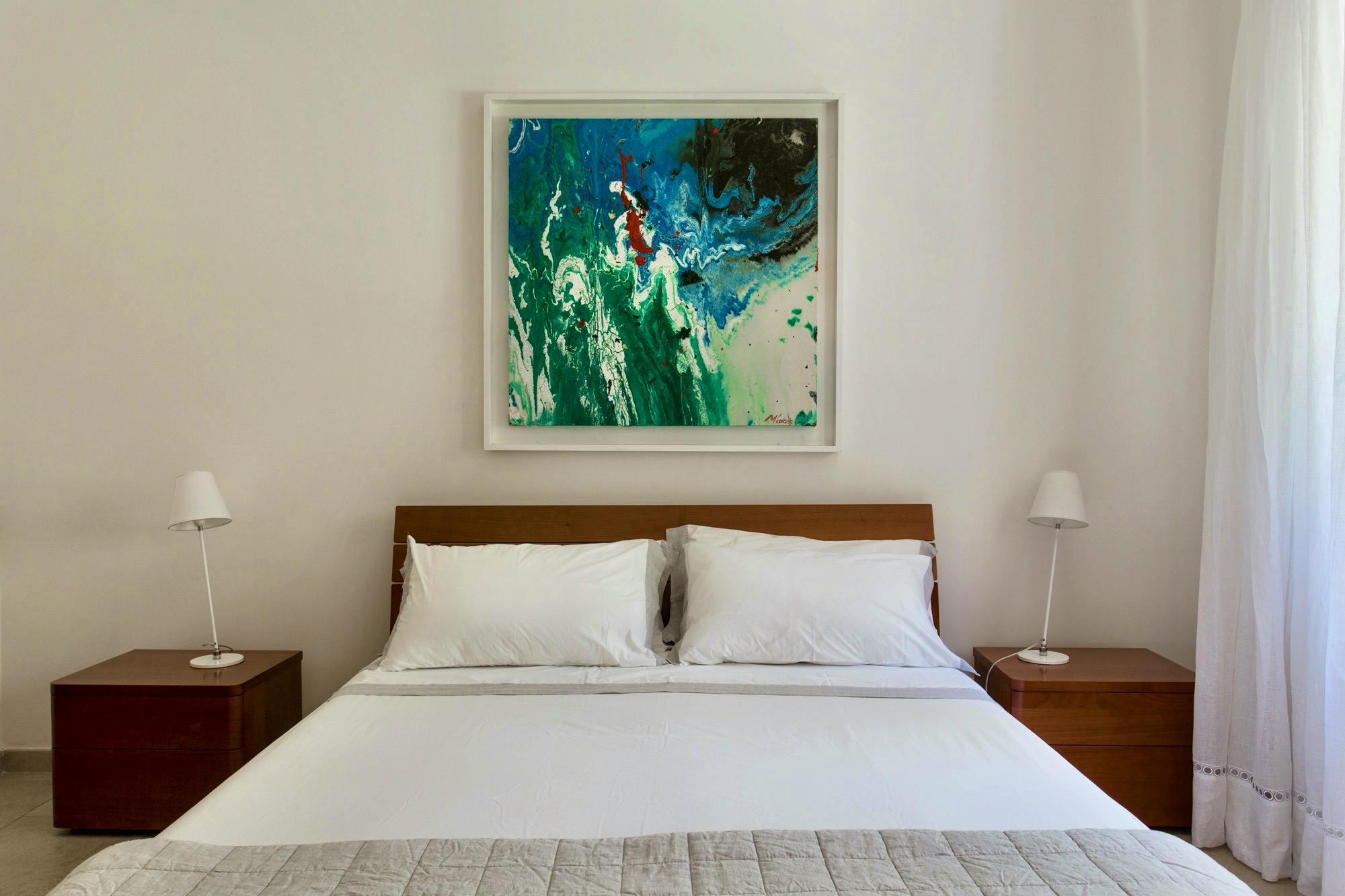 Master bedroom with original local artwork