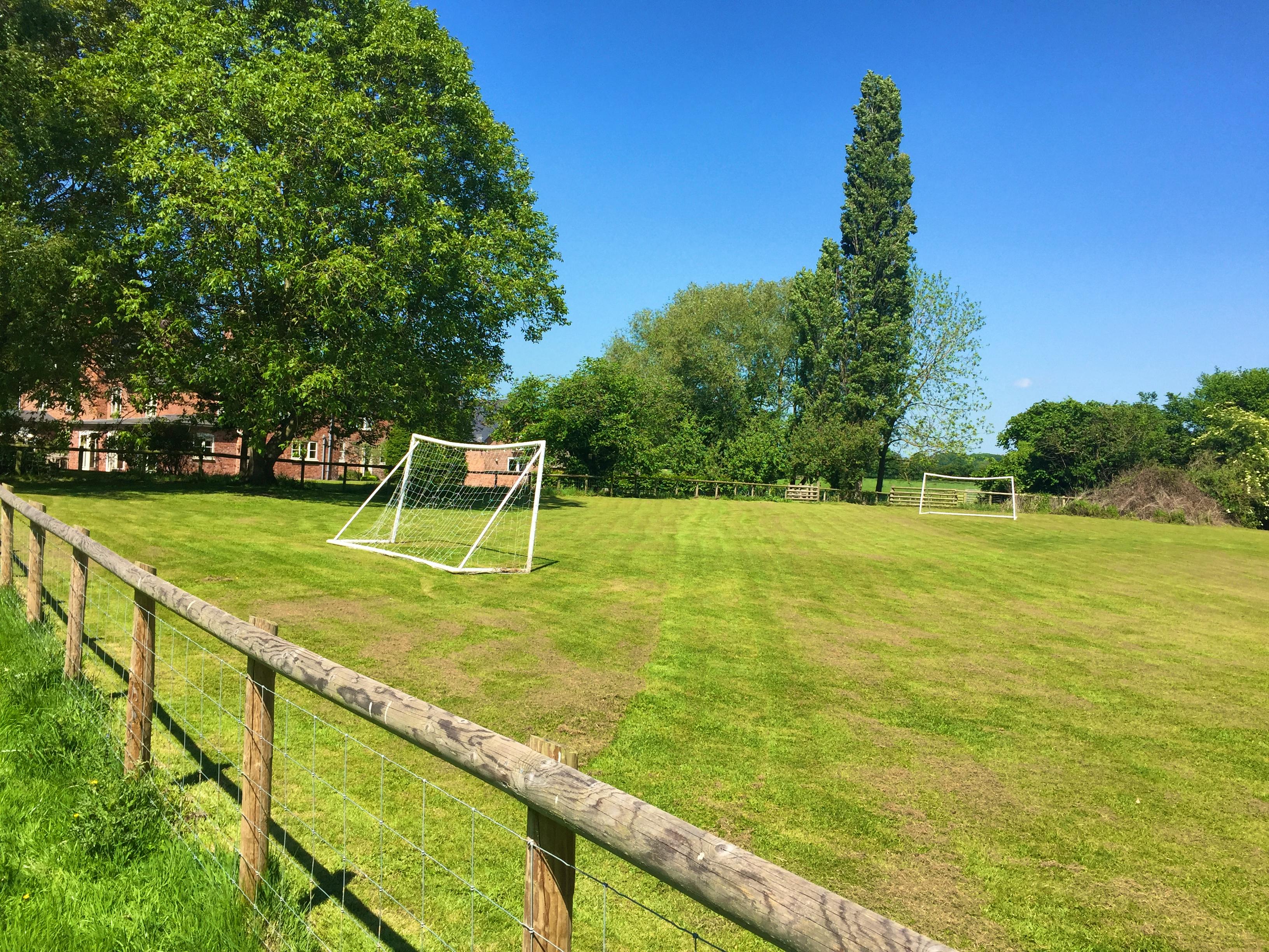 Playing field with 2 football goals