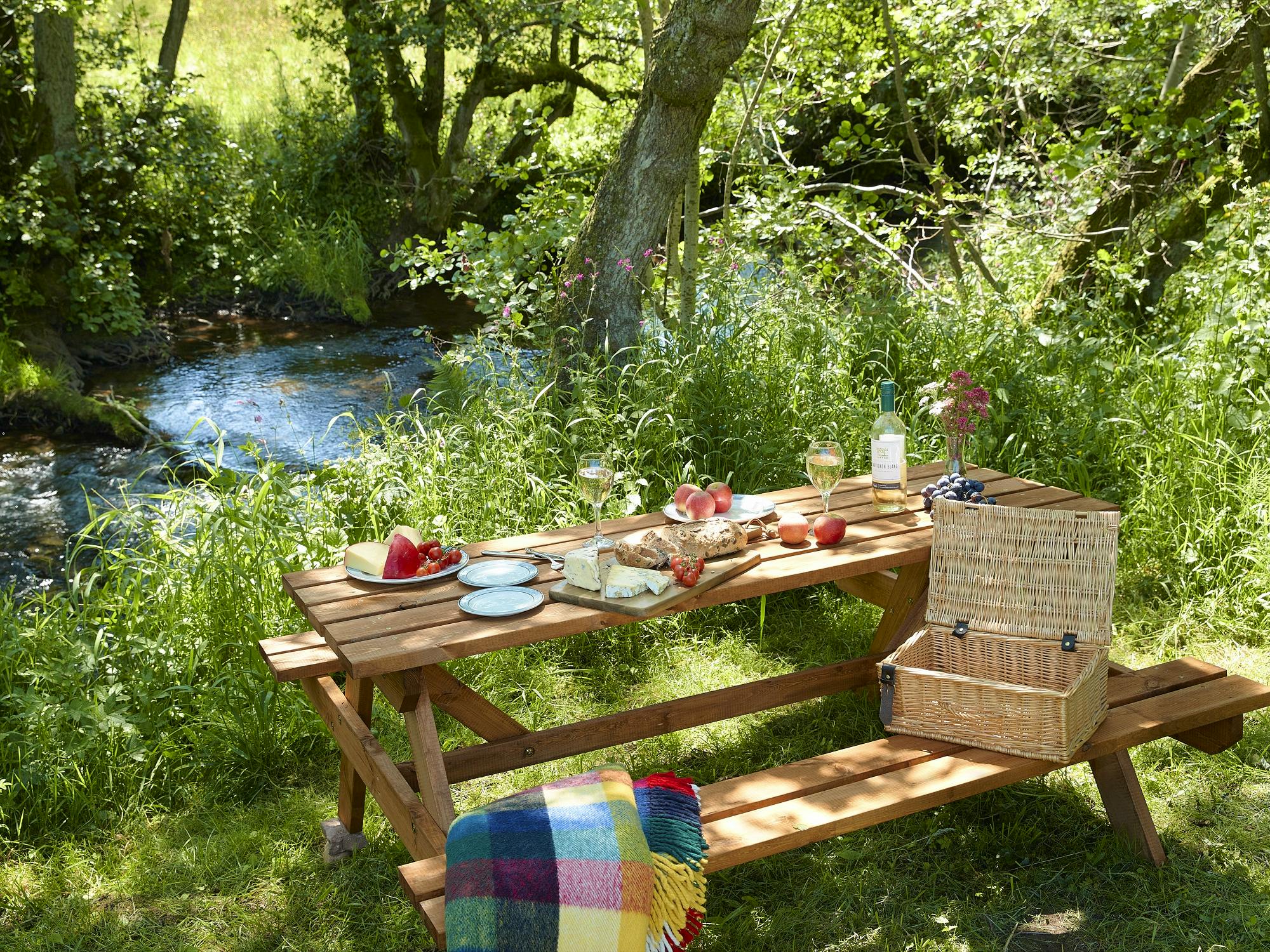 private picnic table by the river front at Elm Retreat and Rowan Retreat