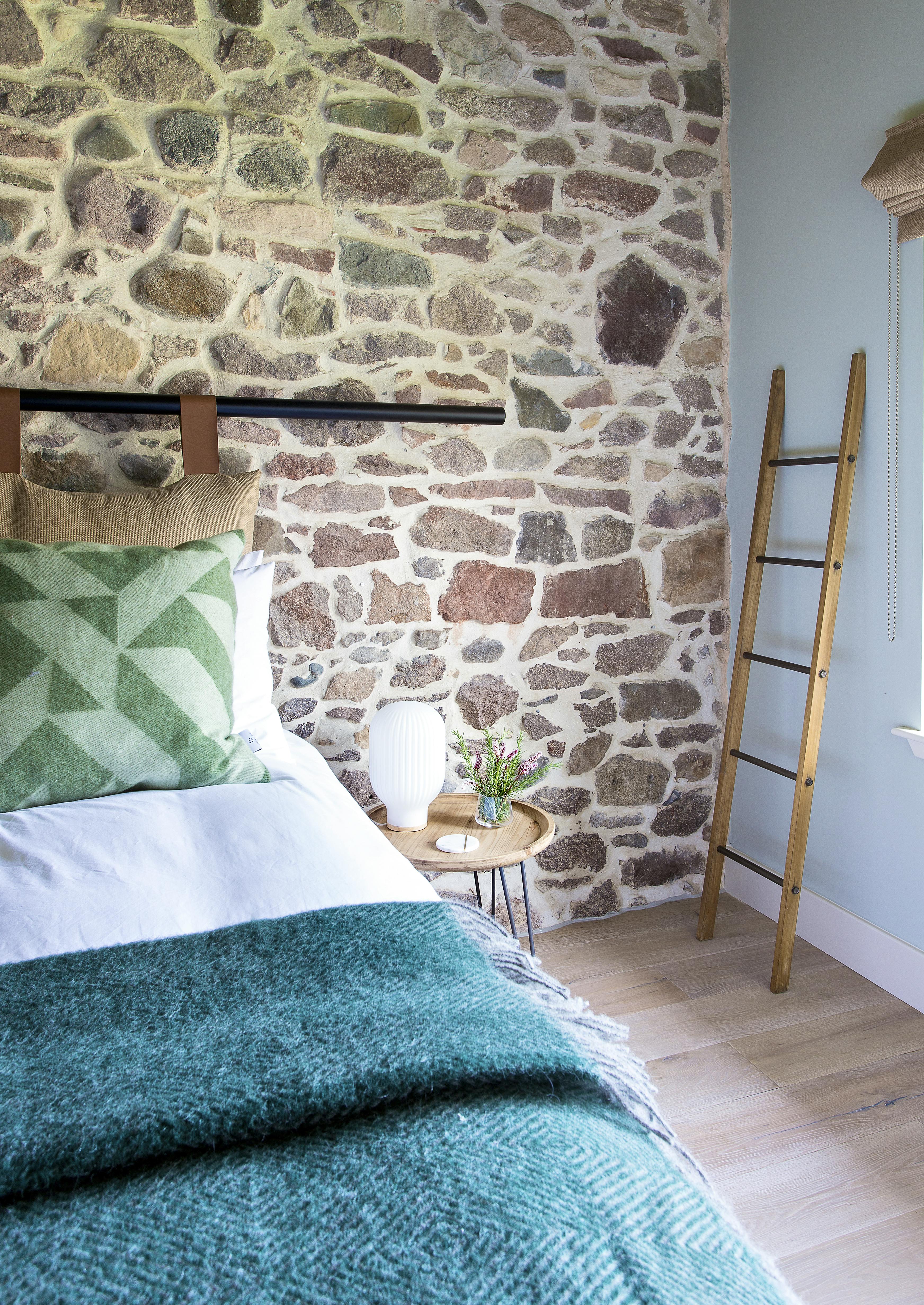 Original stones walls in Bedroom 2 