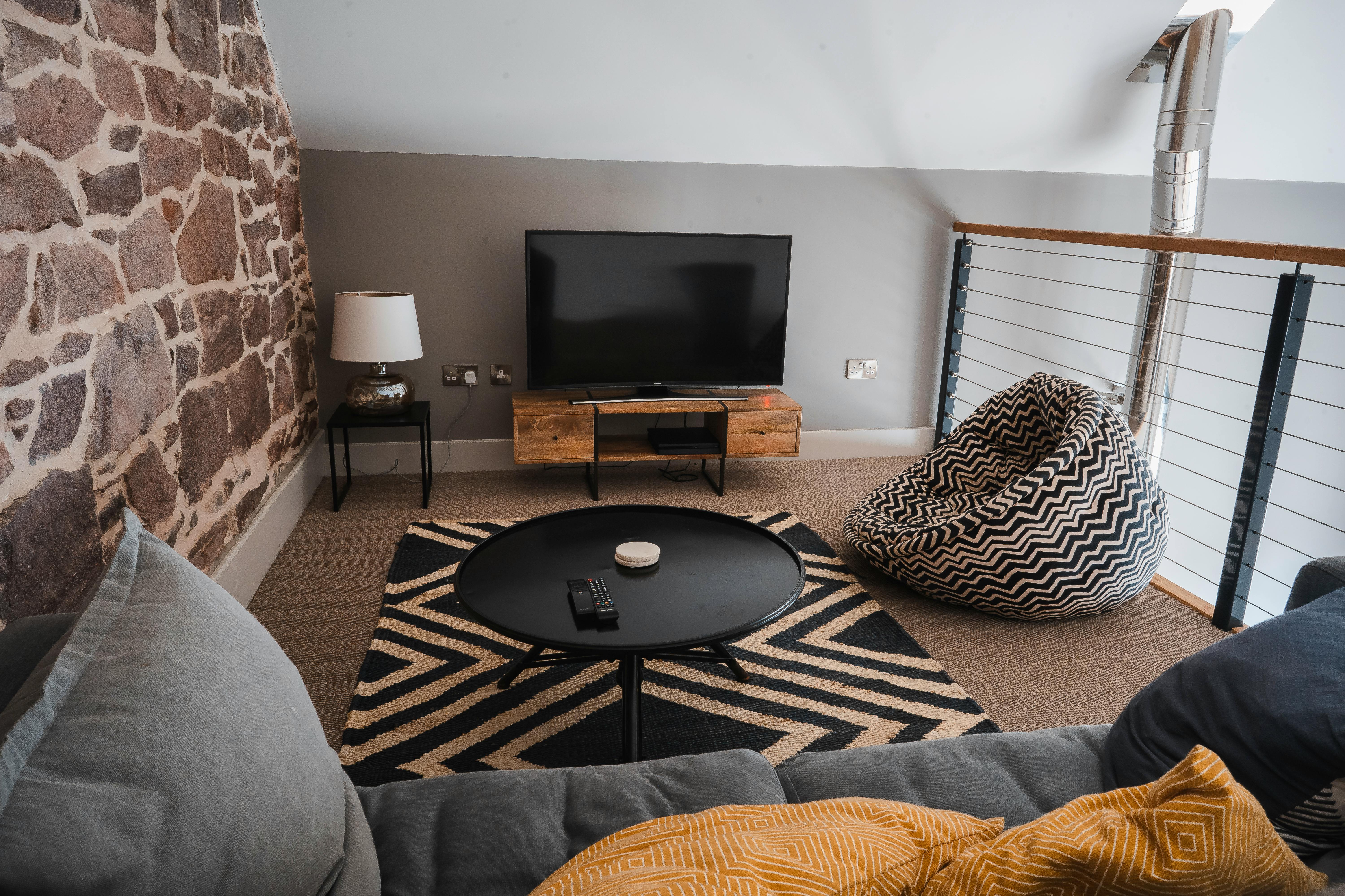 Mezzanine level with Smart TV, PS4 and double sofa bed