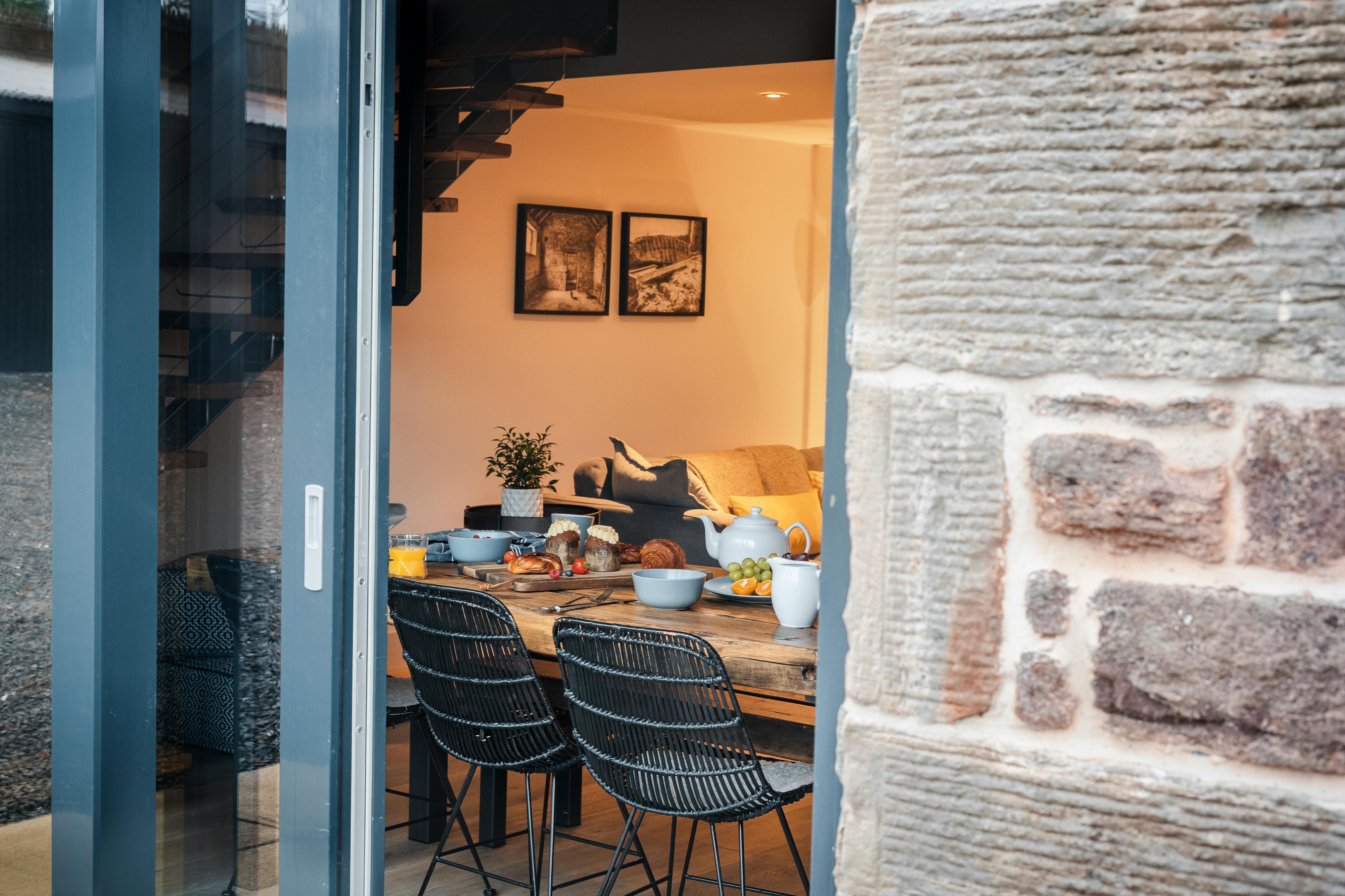 Living room dining area with large slider