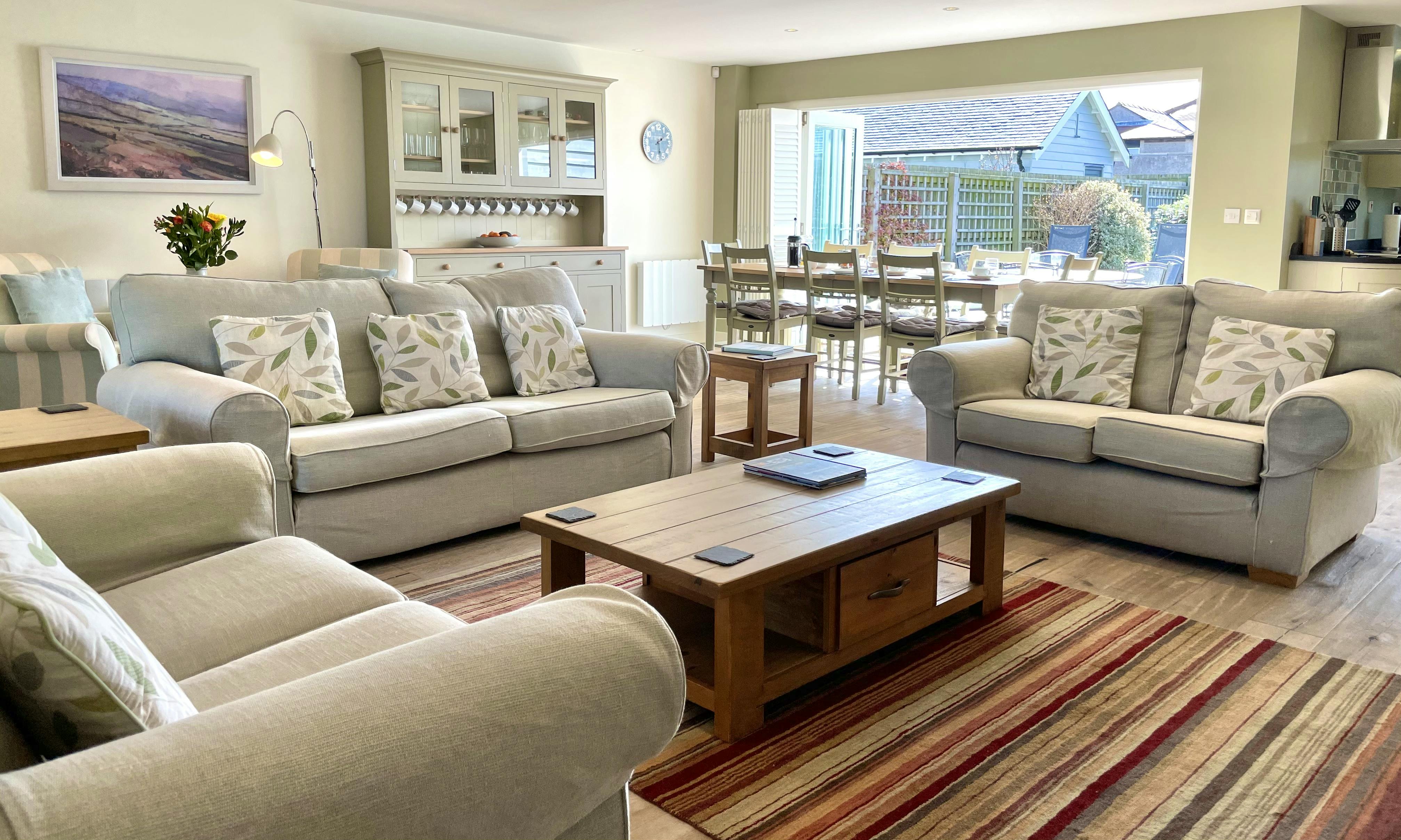 Open Plan Living Space at Waterford with bifold doors opening out onto the patio