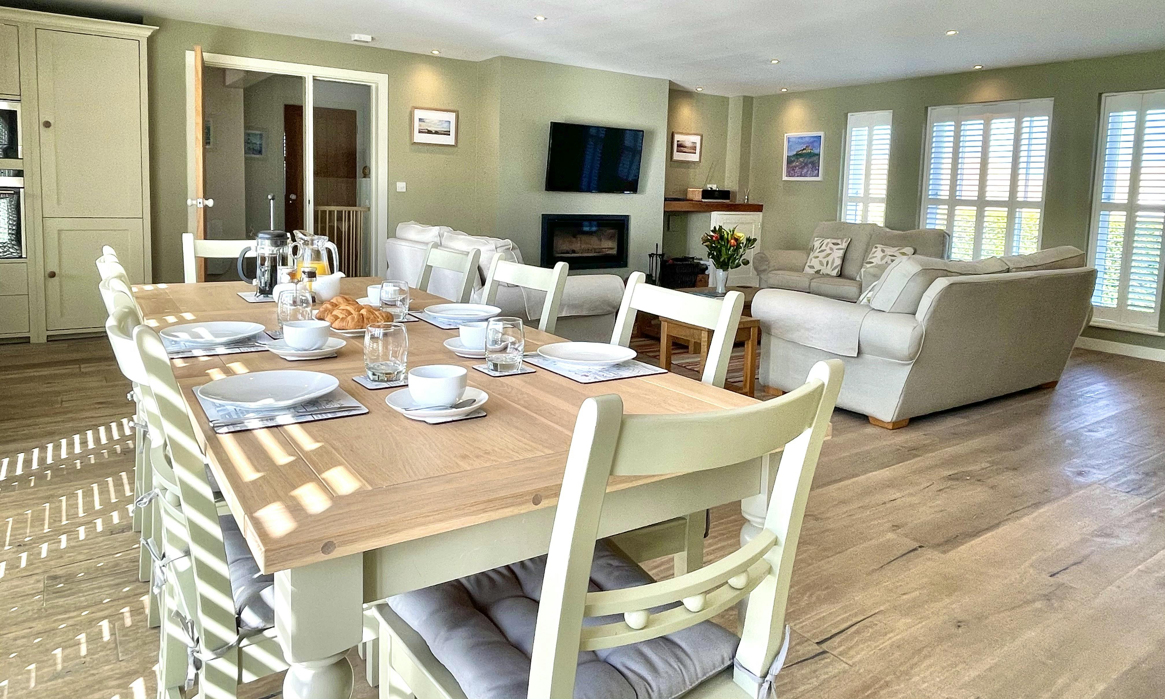 Waterford Dining & Living with big Smart TV and contemporary log burner the focal points 