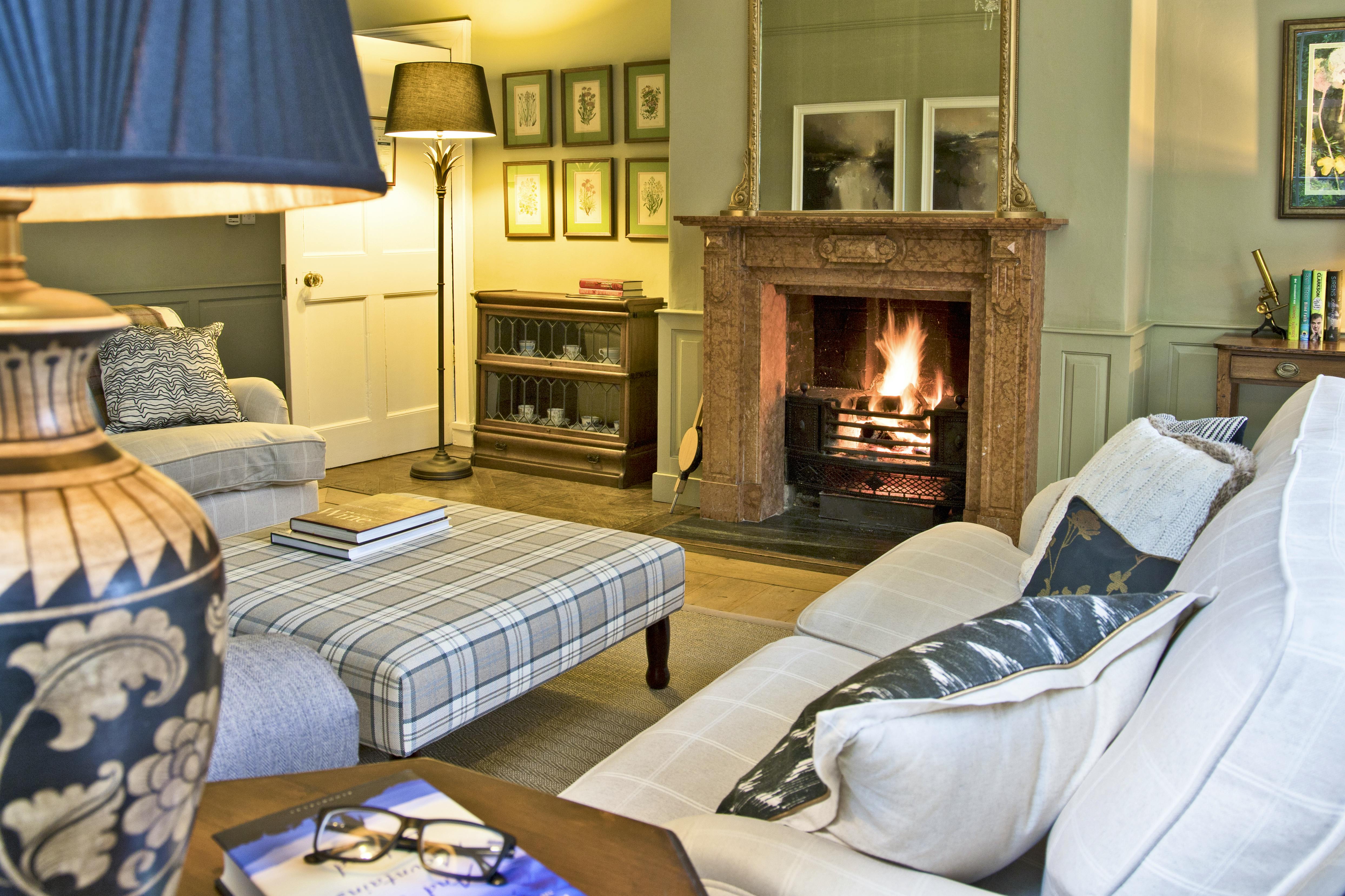 Cosy, open fire in living room