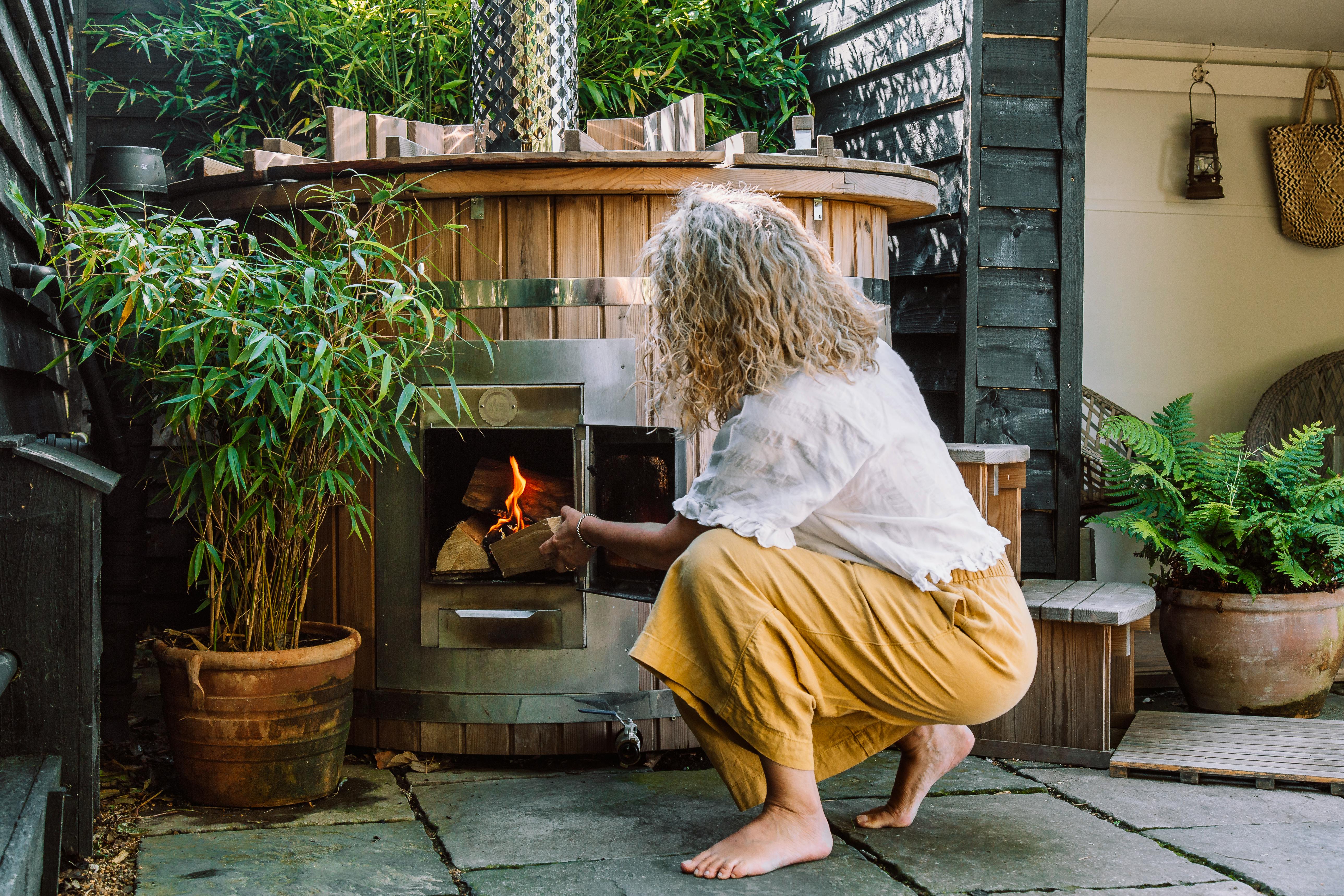 Lighting the wood fired hot tub