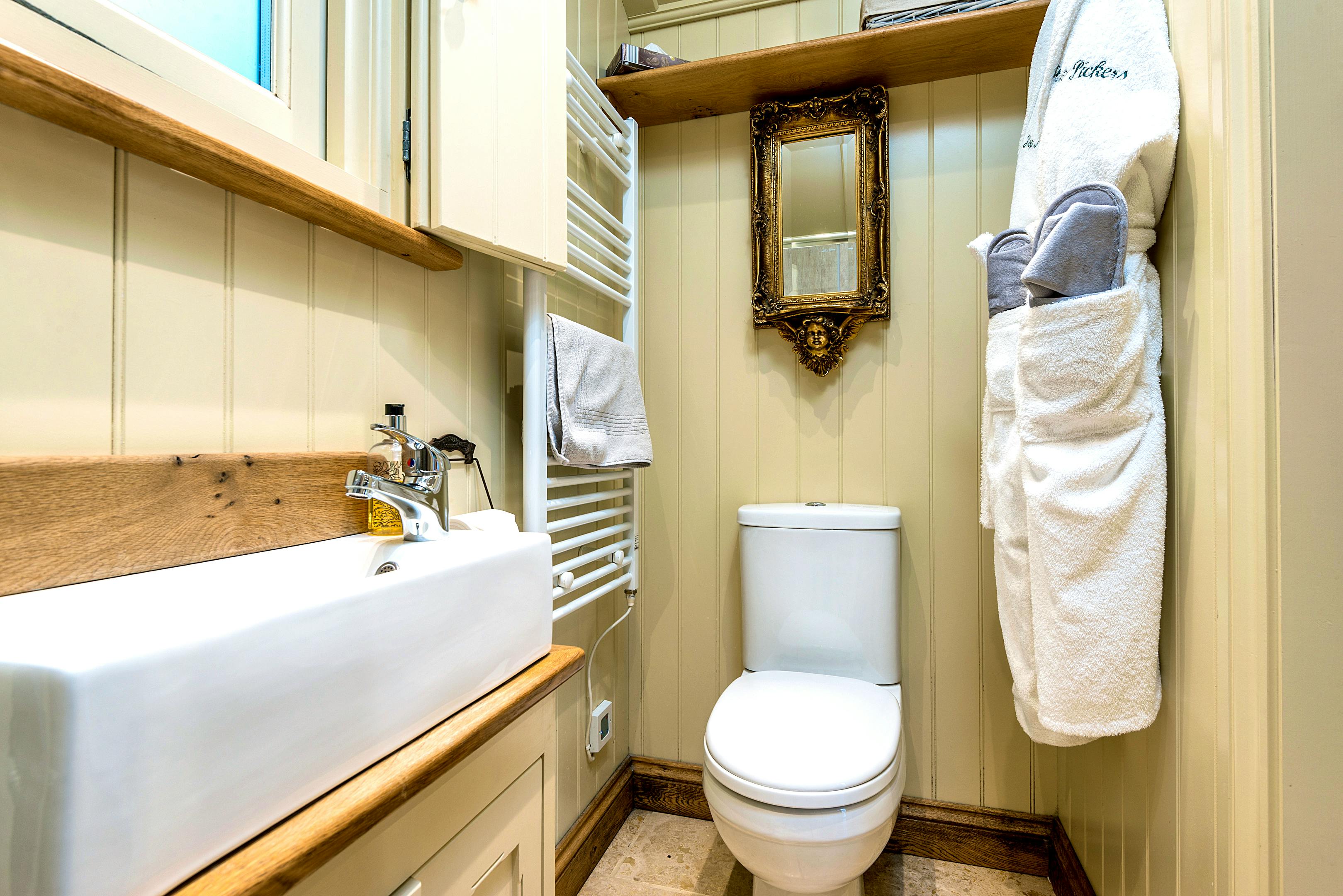 Ensuite shower room, bath robes