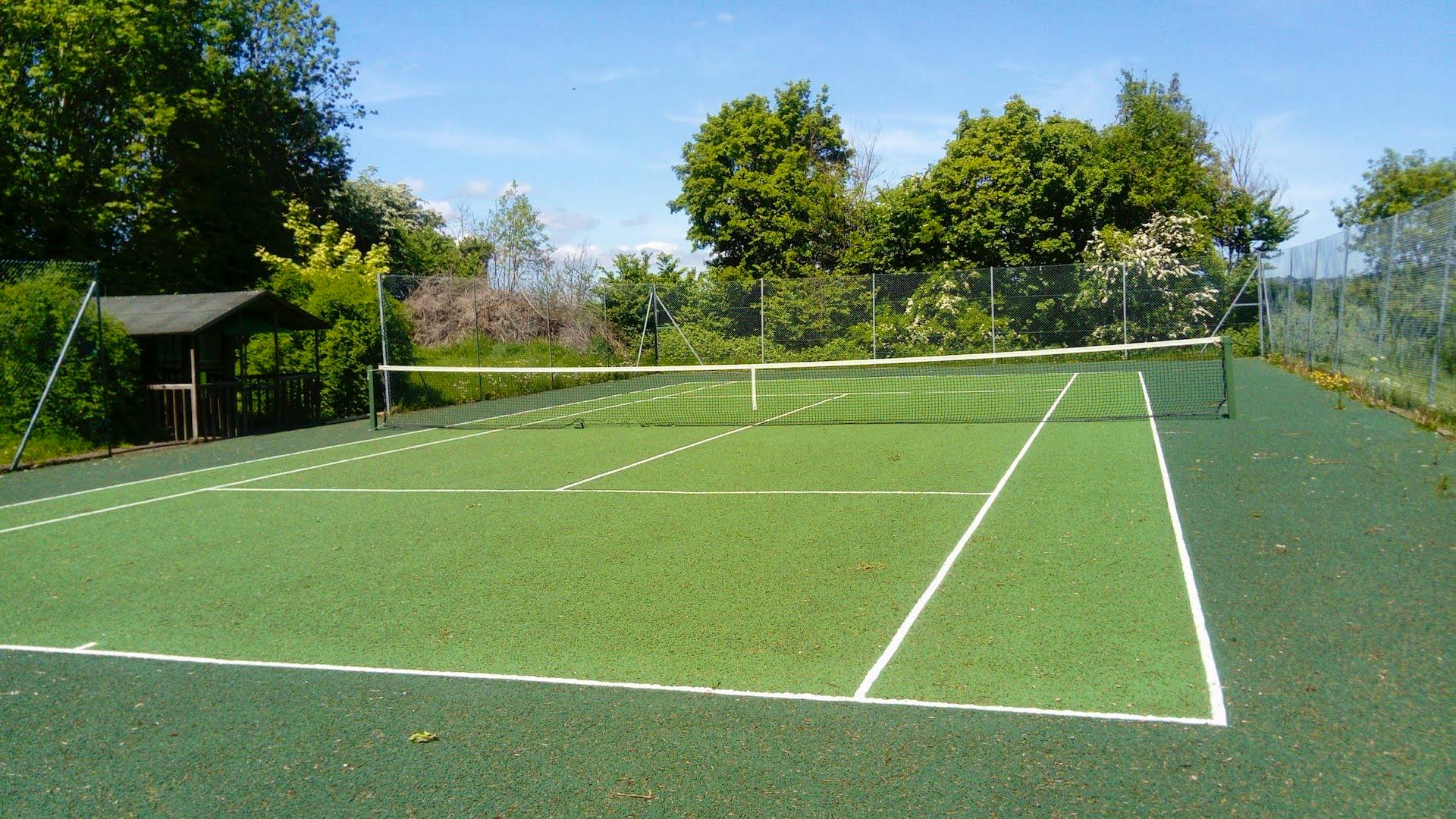 Tennis Court and hut