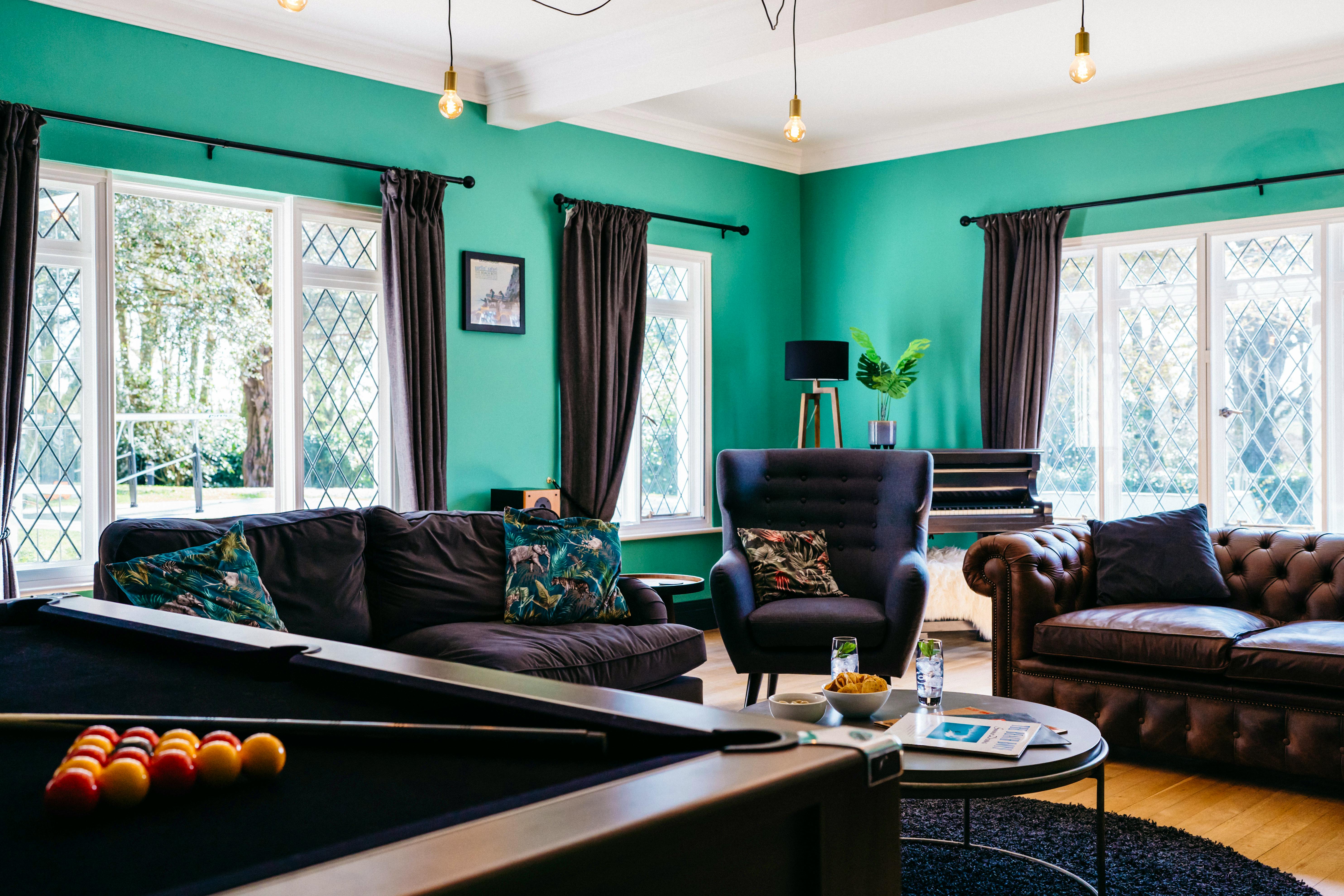 Games room with pool table and bar