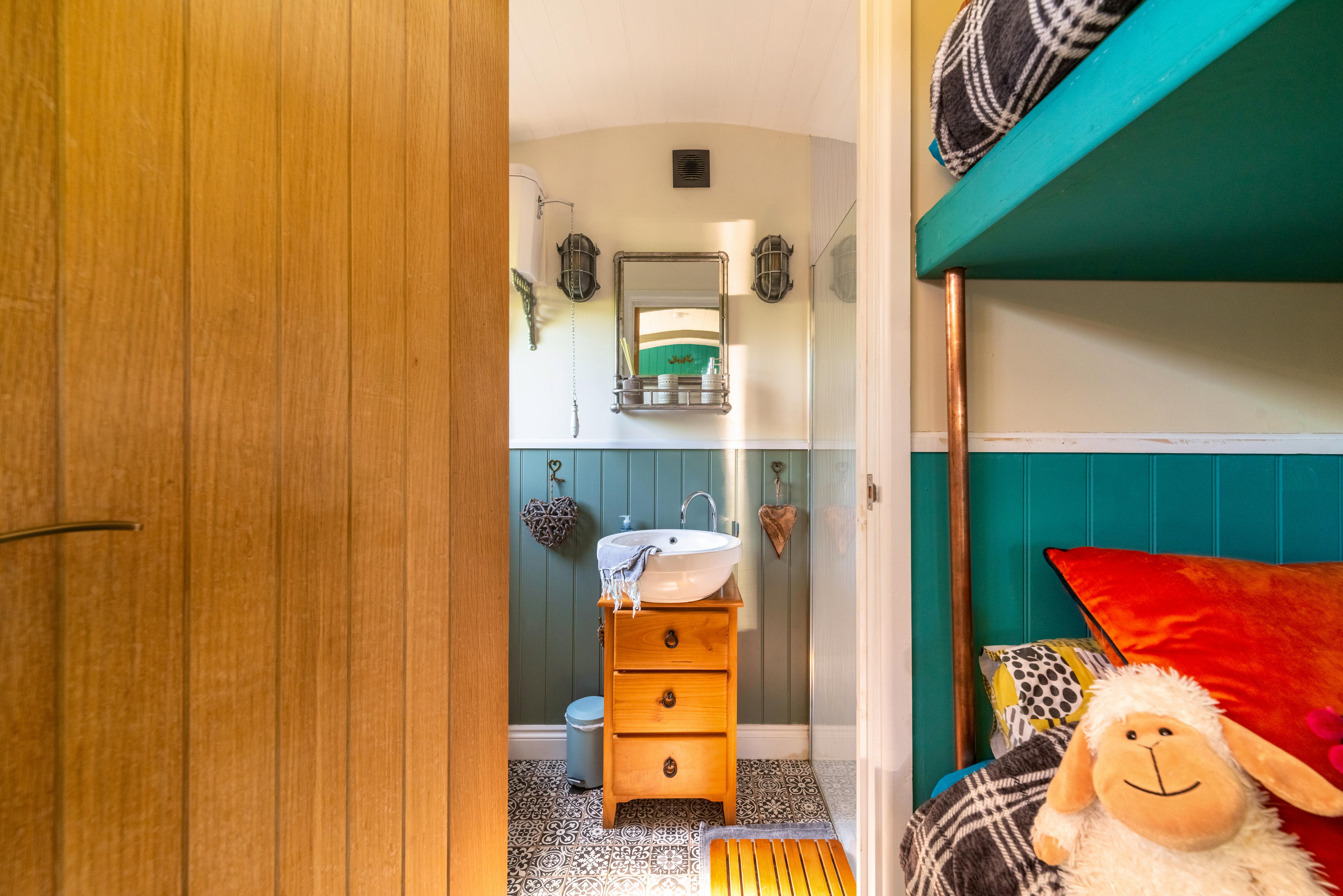 En-suite bathroom with flush toilet