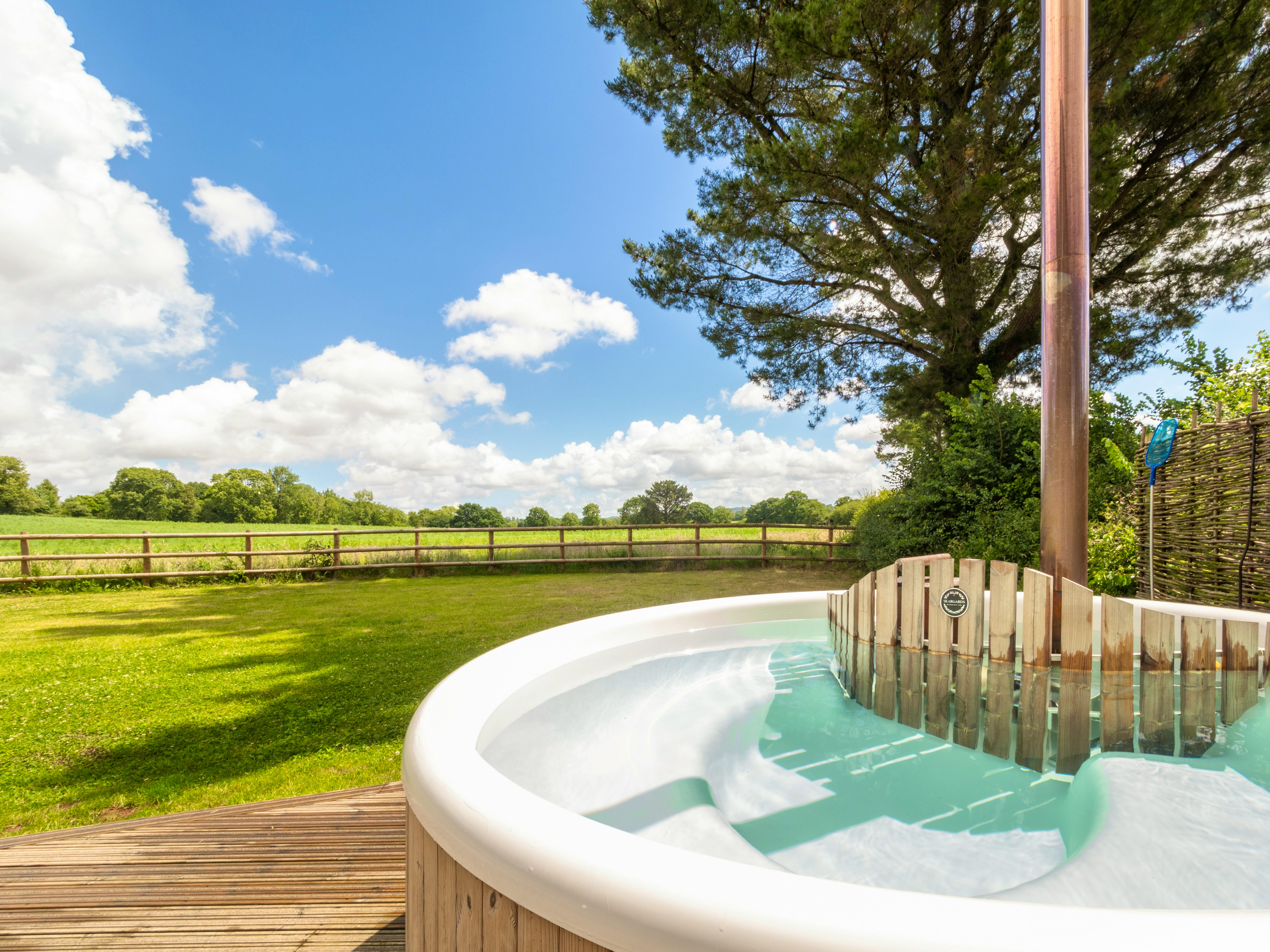 The large wood fired hot tub 
