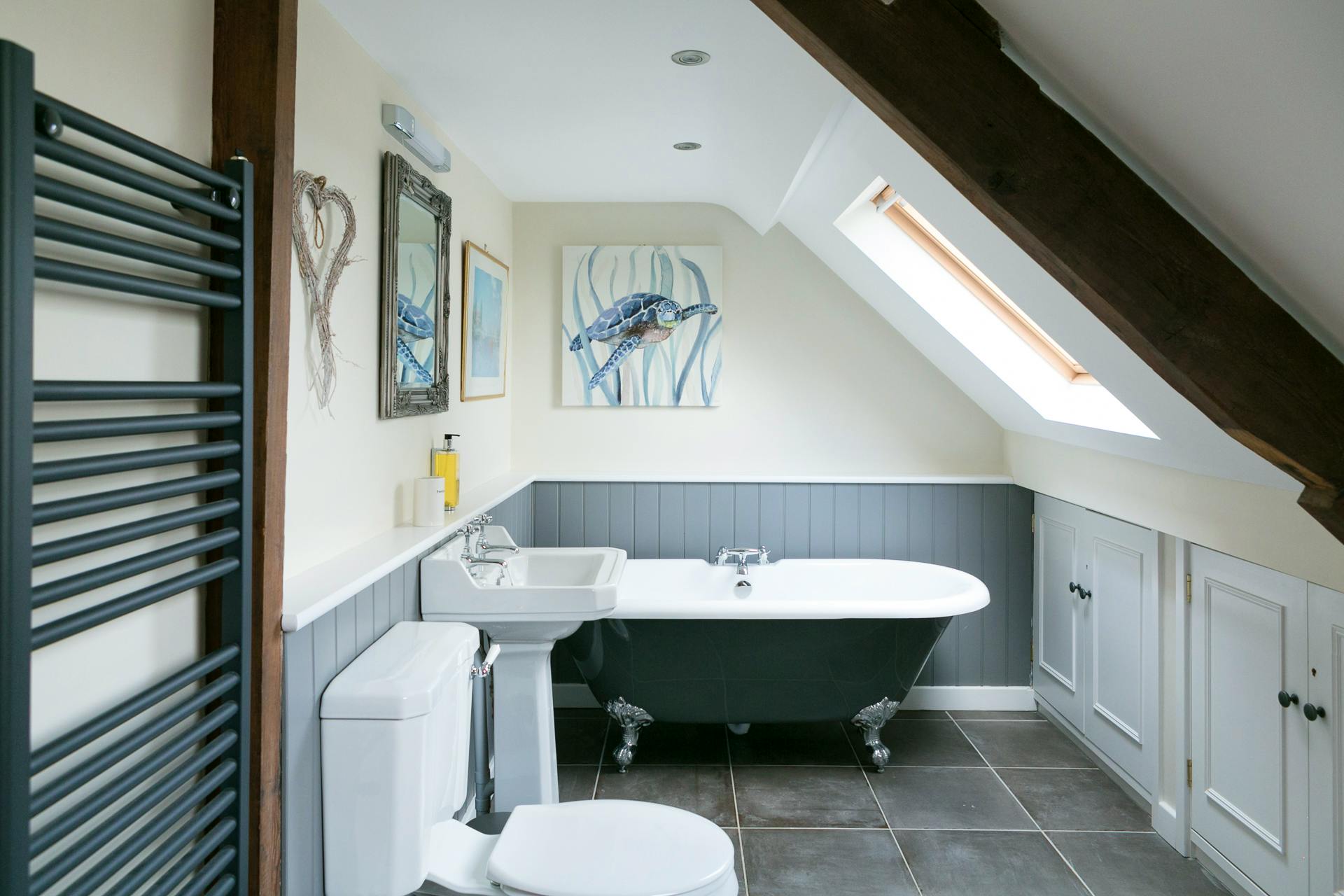 Relax in the gorgeous roll-top bath