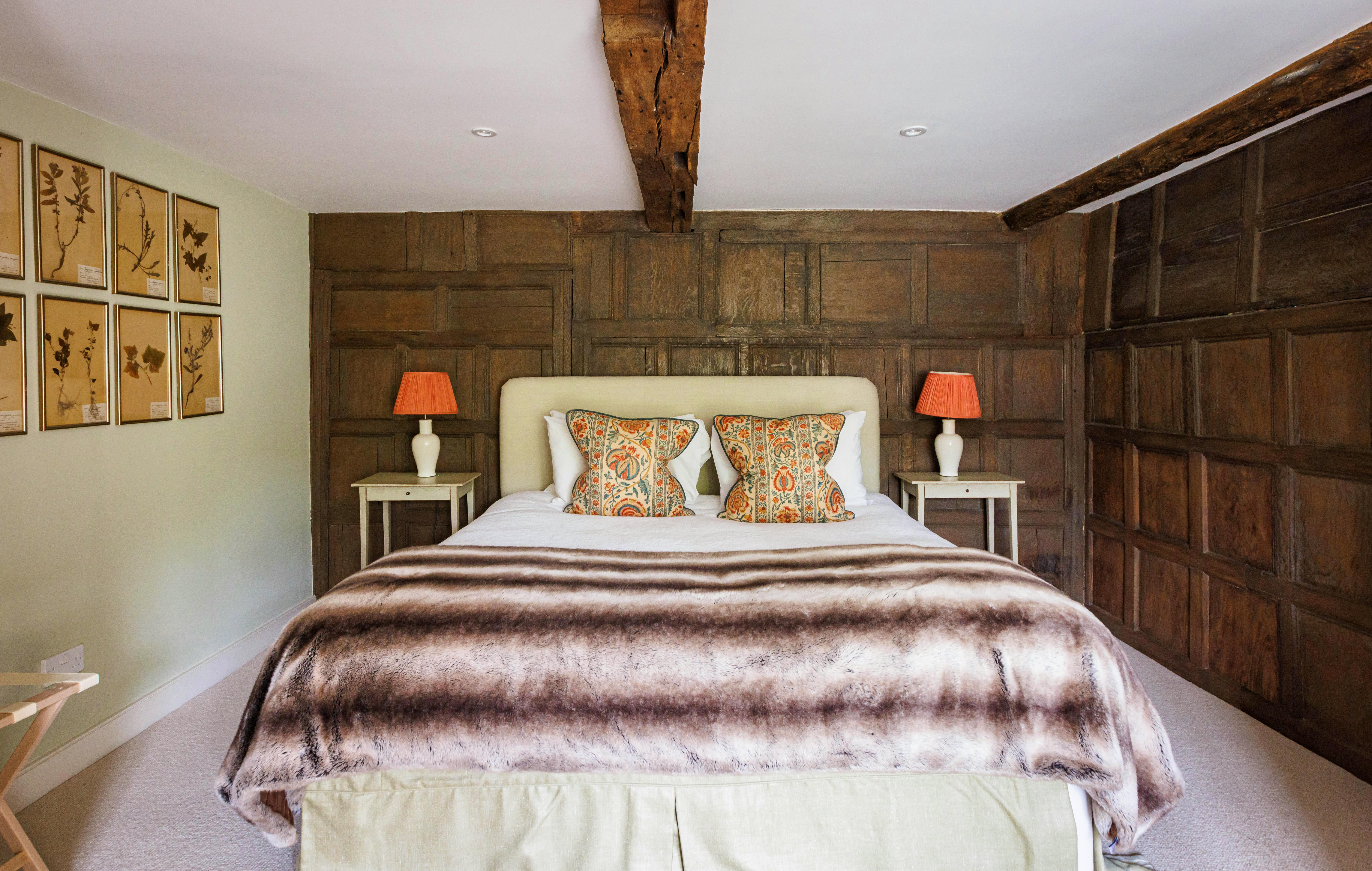 Double room with wood panelling 