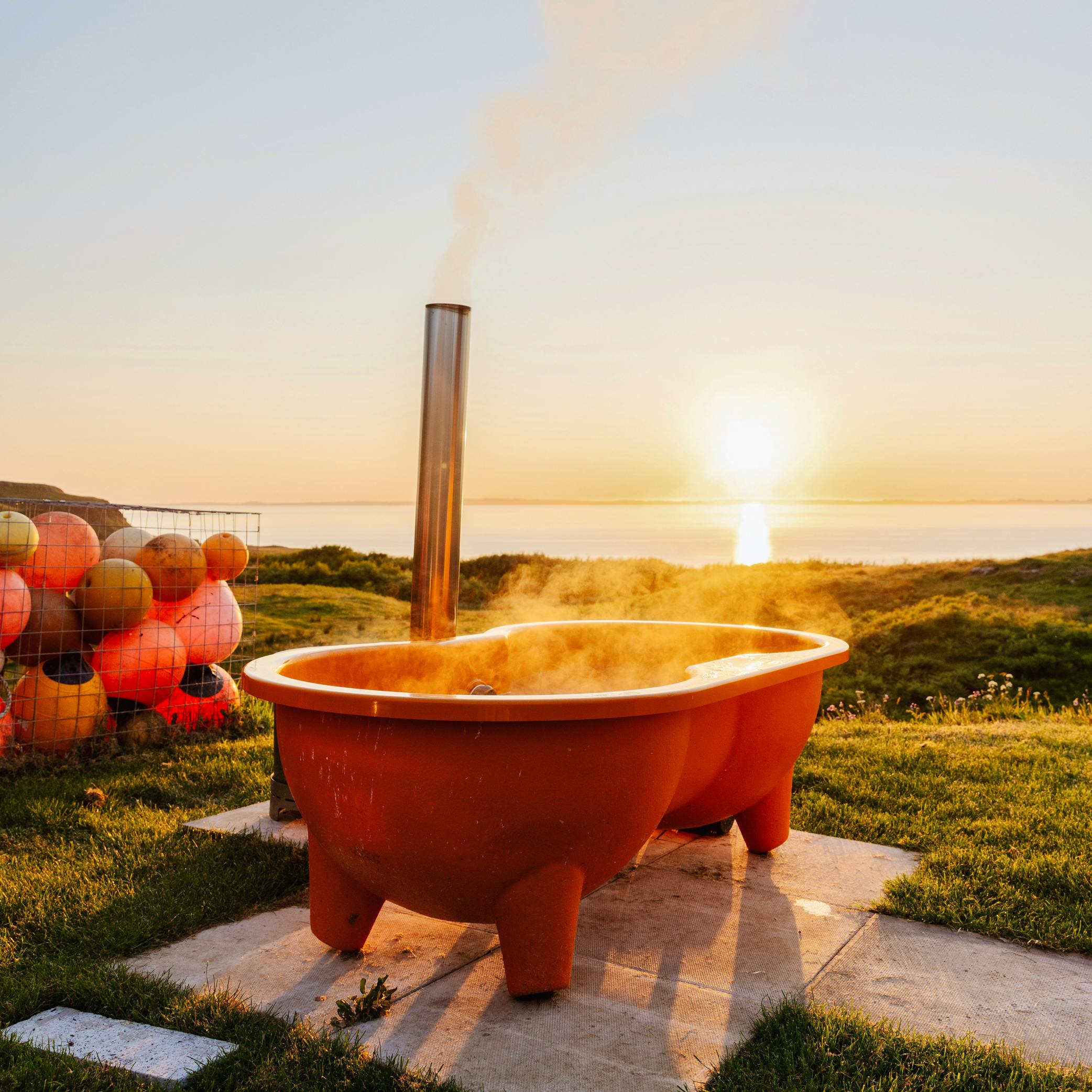 Outdoor bath at sunset 