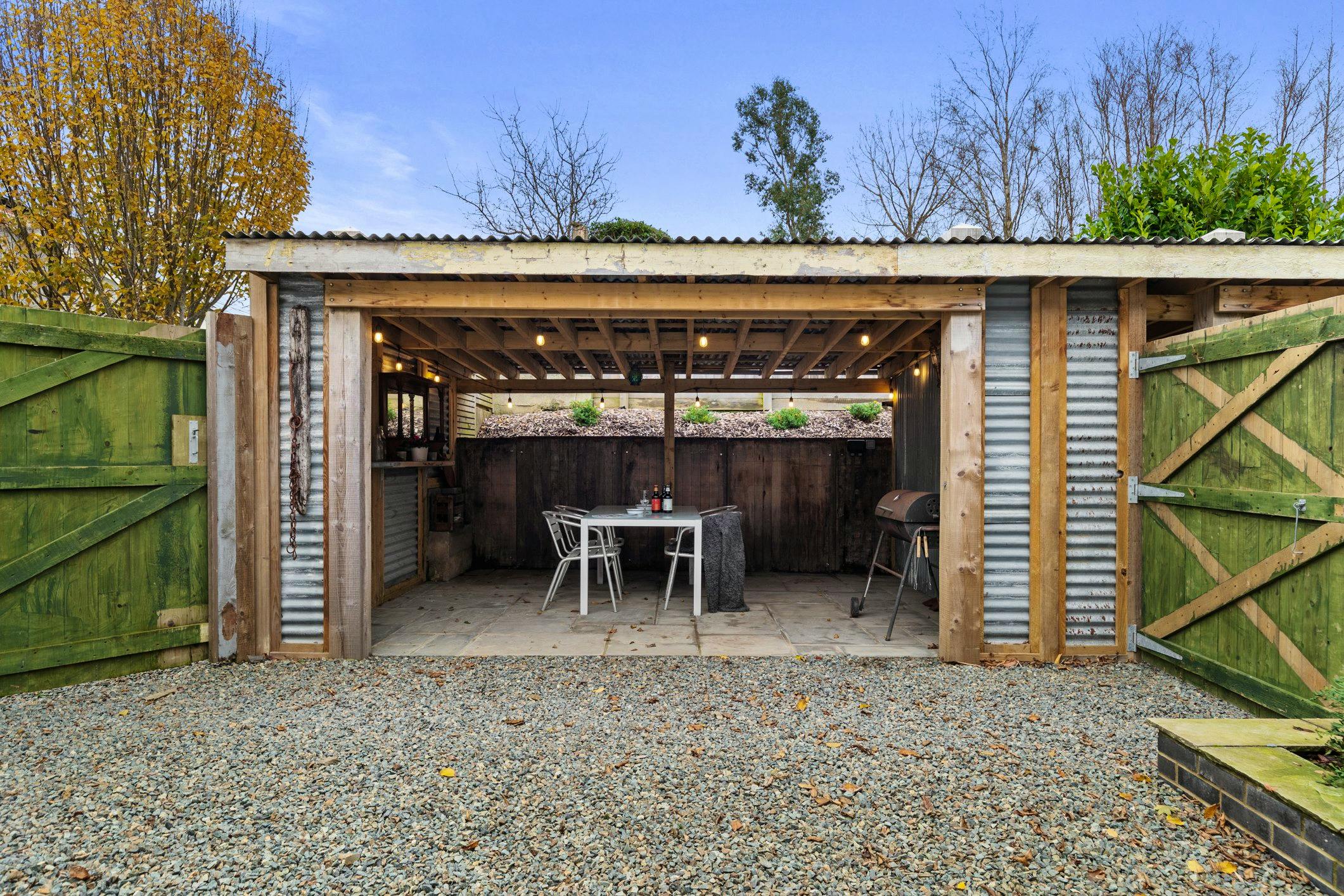 Enclosed area with covered BBQ