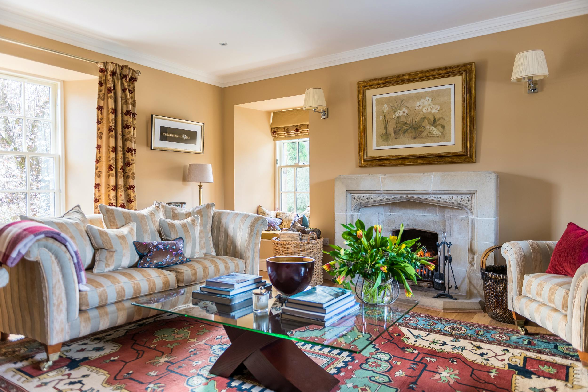The upstairs TV Room with log fire