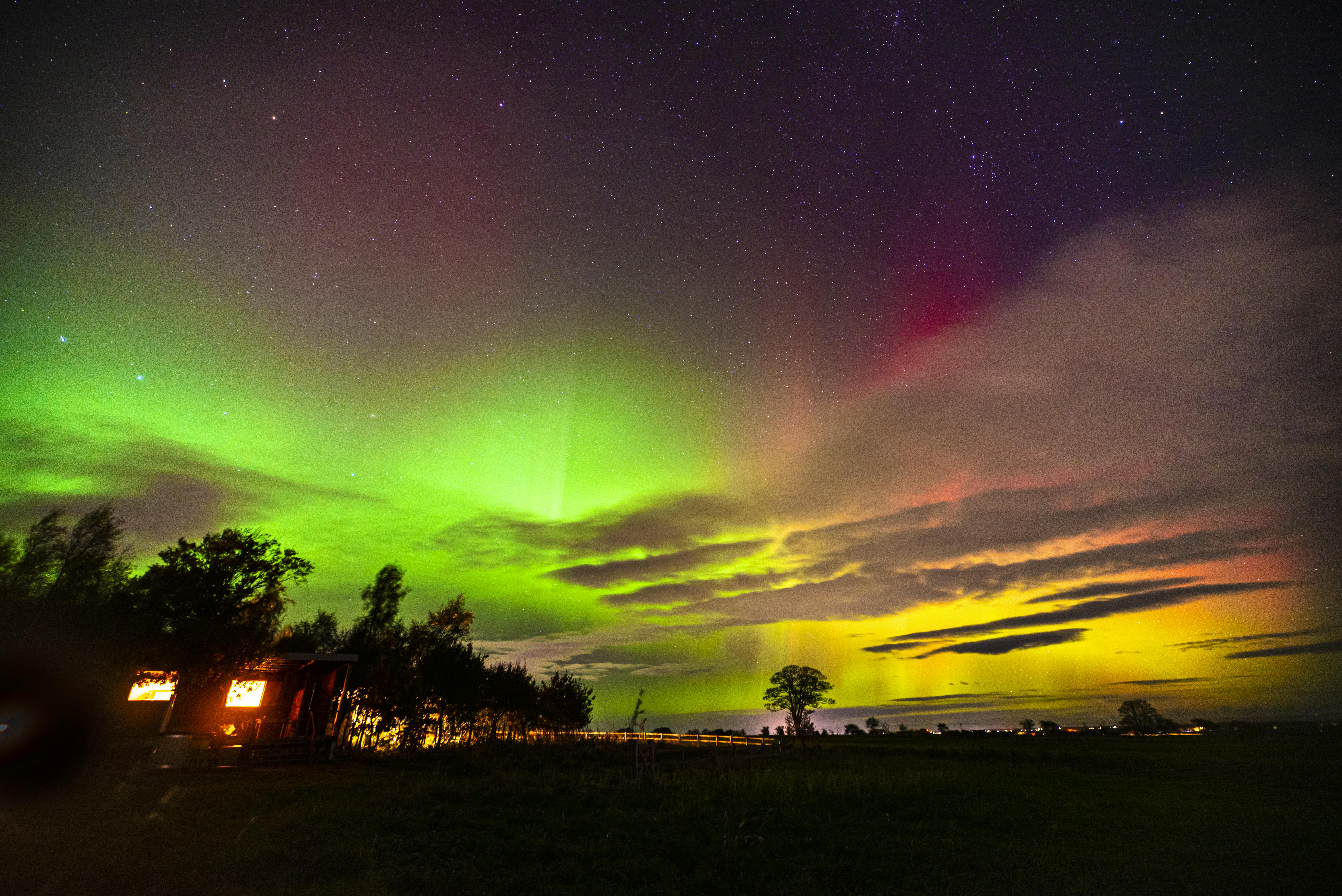 Northern Lights over Hillside Huts