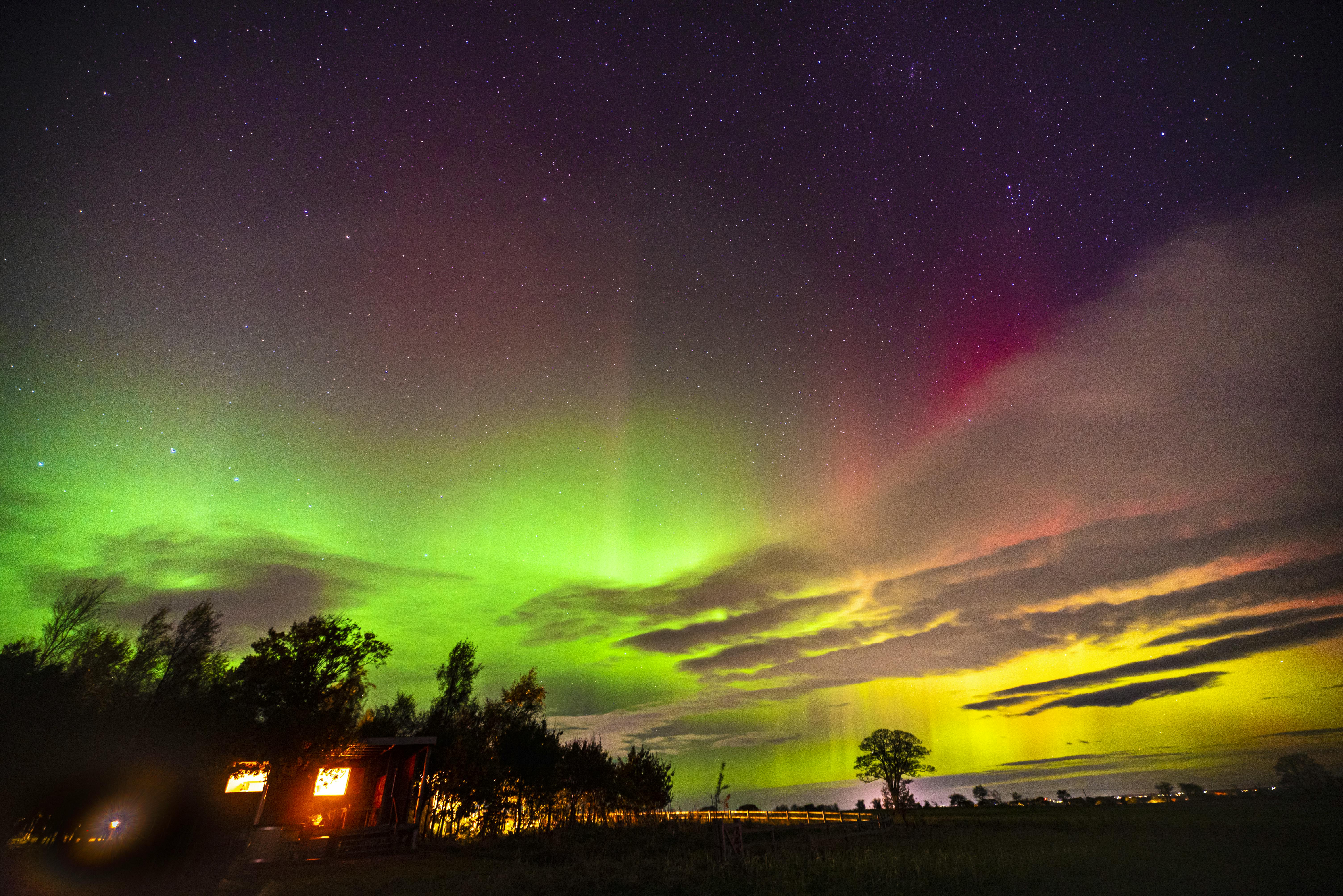 Northern Lights over Hillside Huts