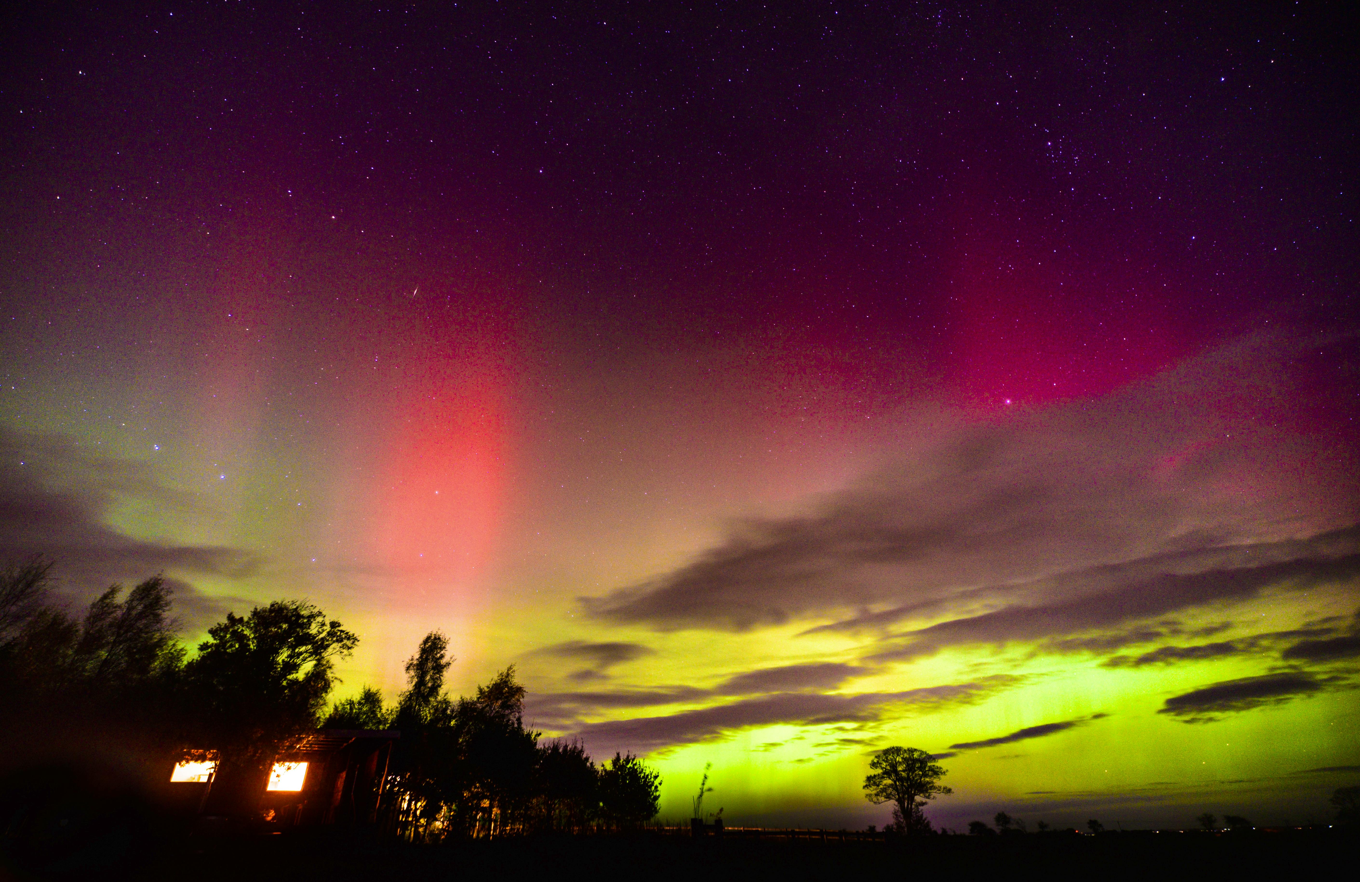 Northern Lights over Hillside Huts