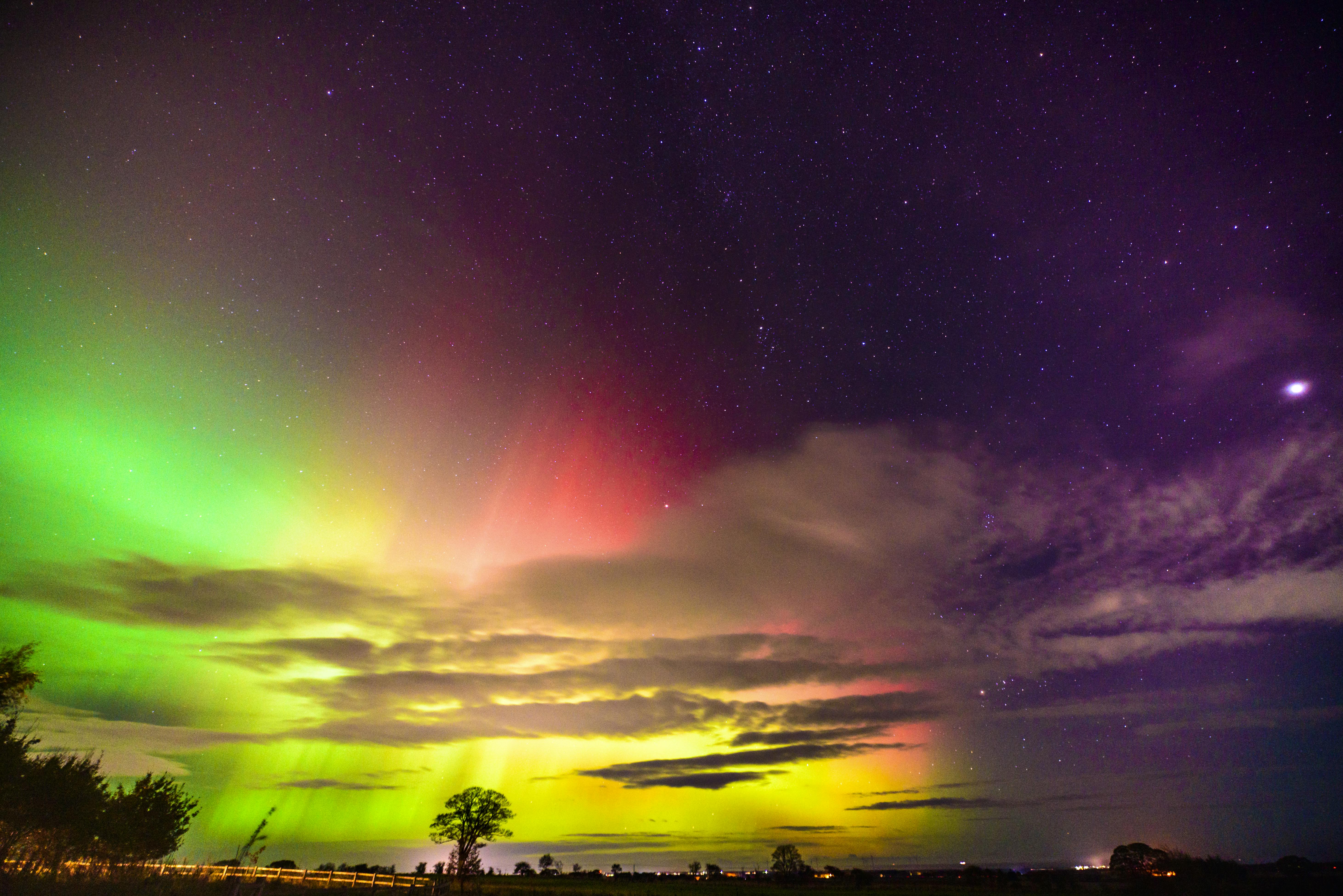 Northern Lights over Hillside Huts