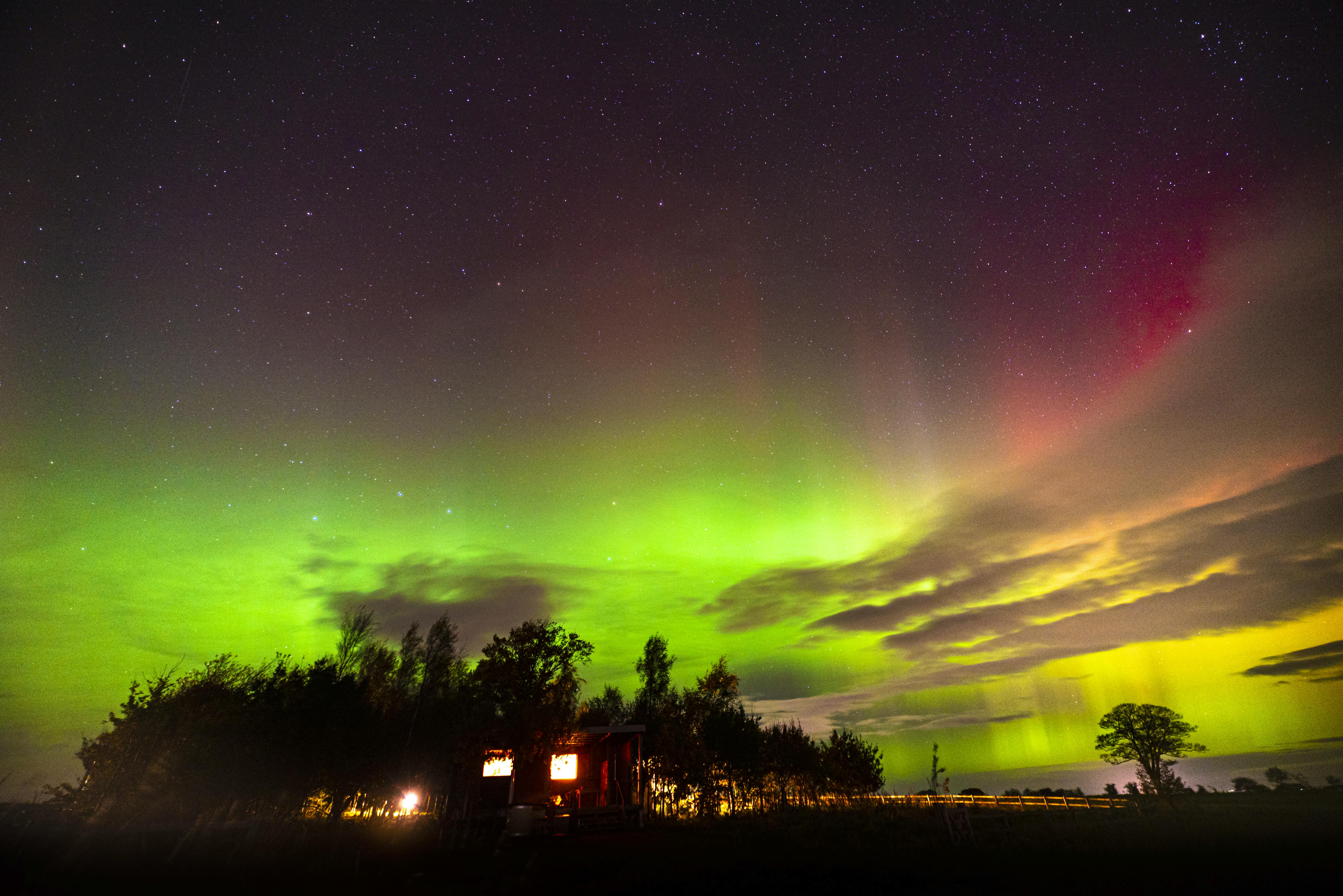 Northern Lights over Hillside Huts