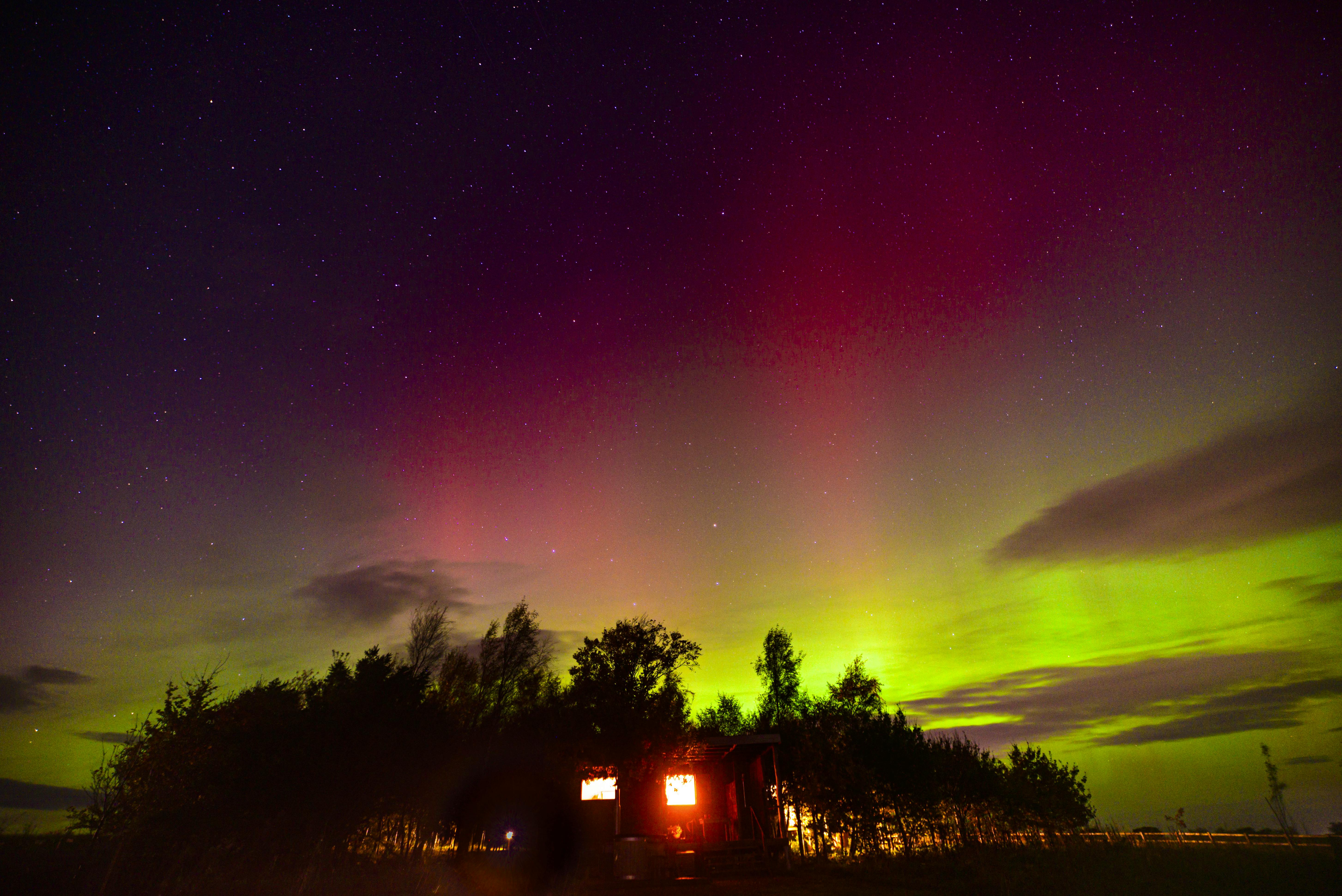 Northern Lights over Hillside Huts