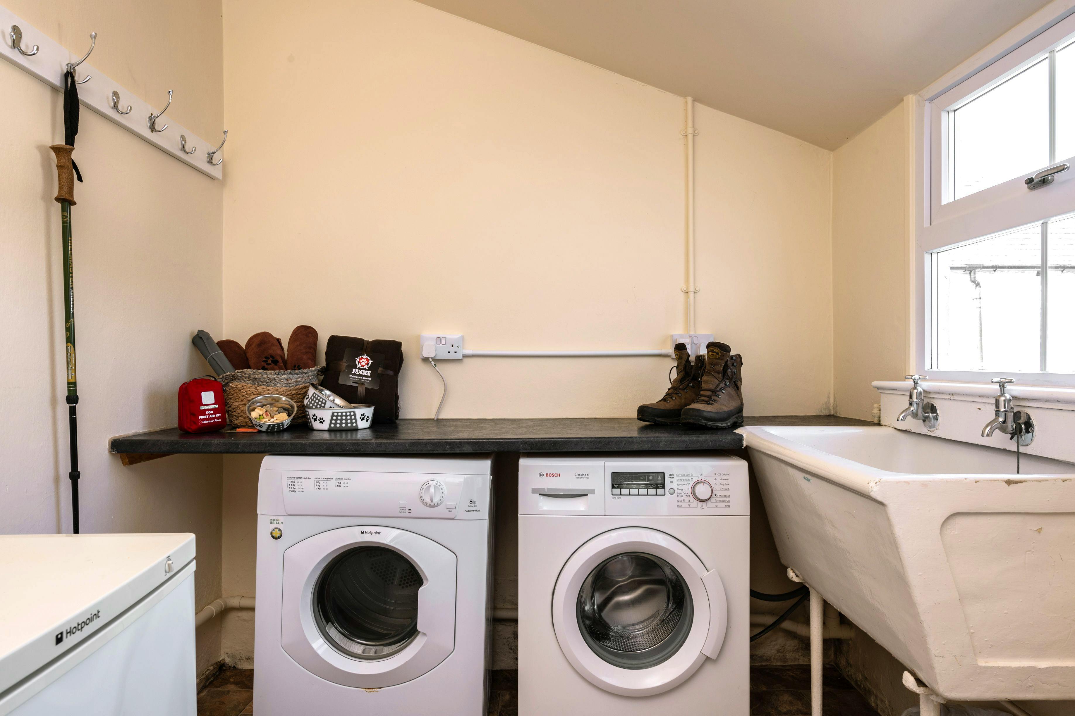 Utility room with washer and dryer