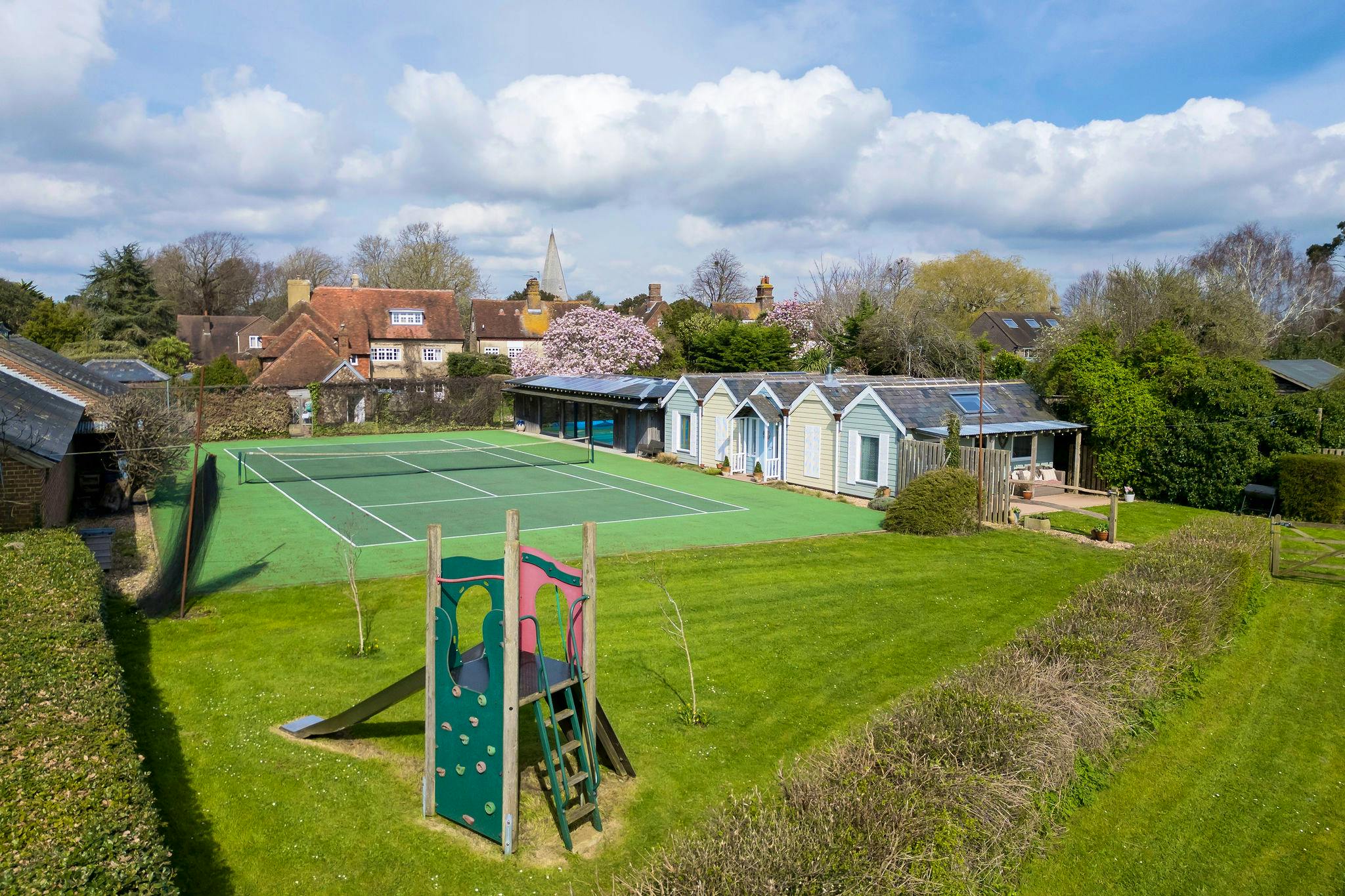 Tennis court , pool & play slide