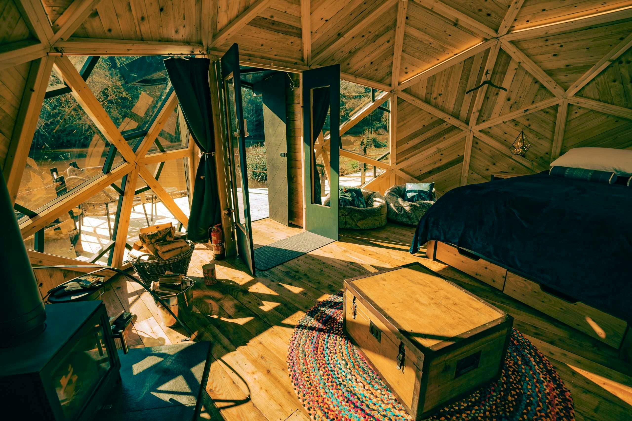 Interior of Kingfisher with its handmade kingsize bed with bamboo bed linen