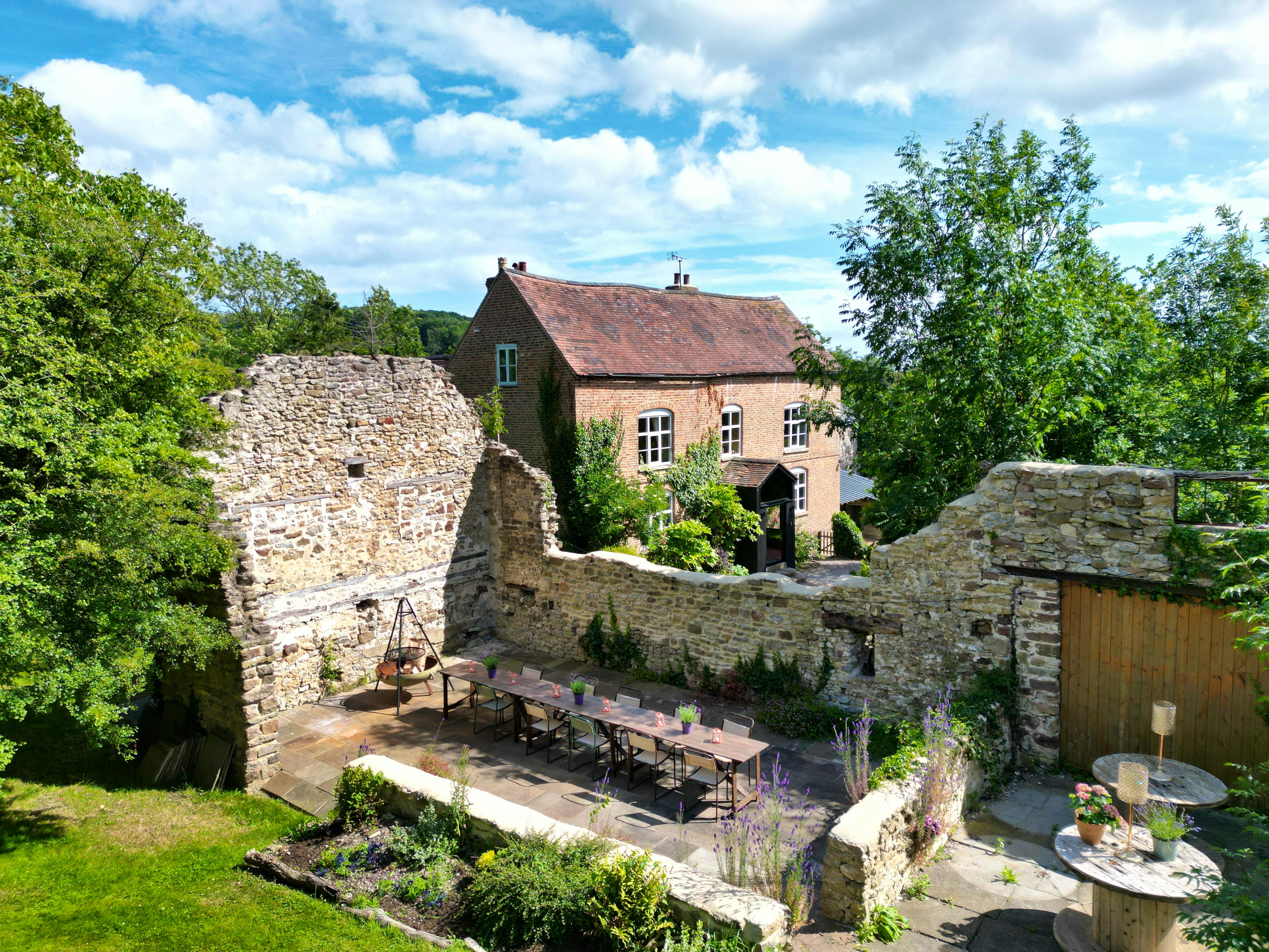 Outdoor dining in barn ruin