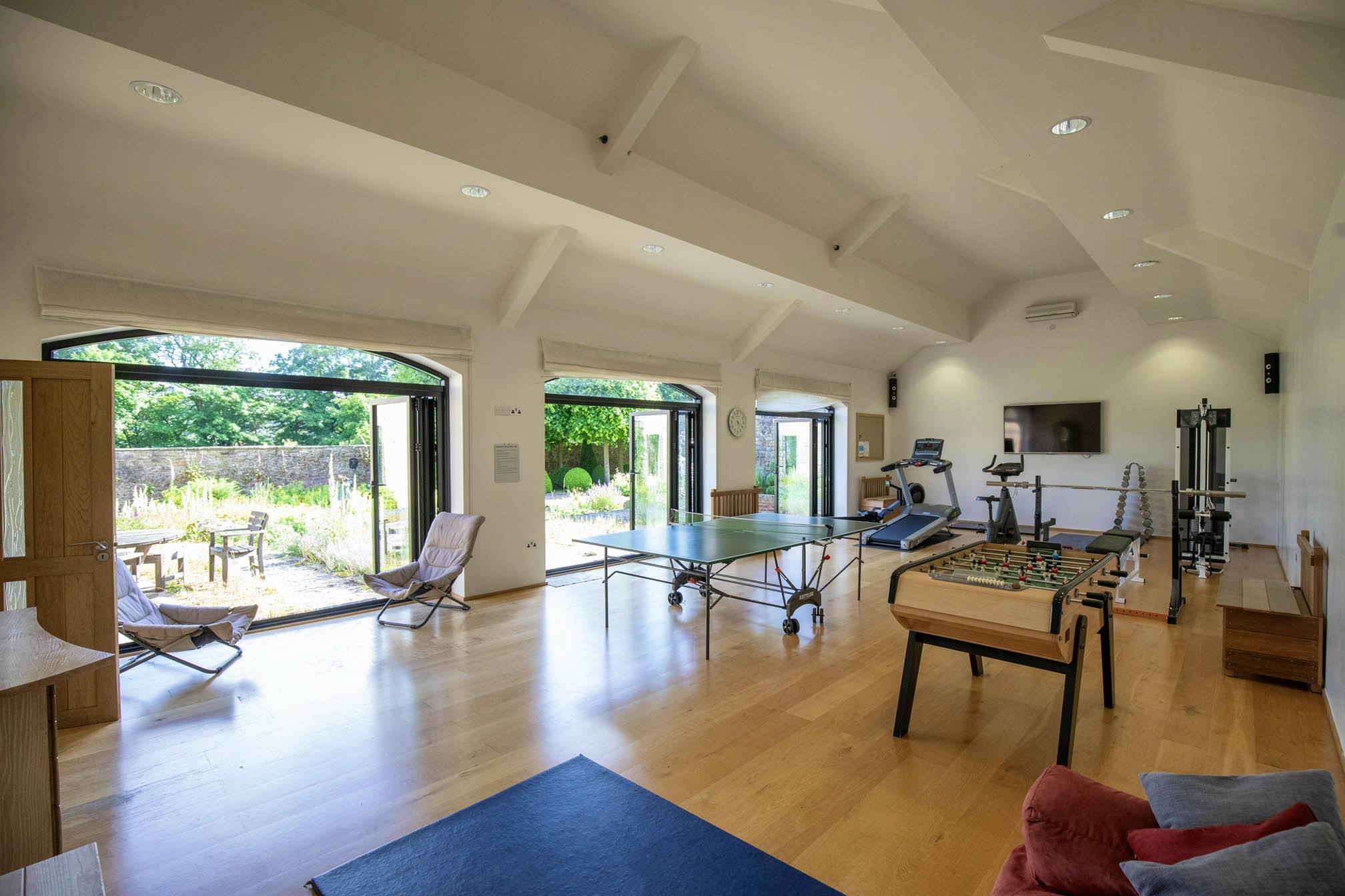 Gym with table tennis and football