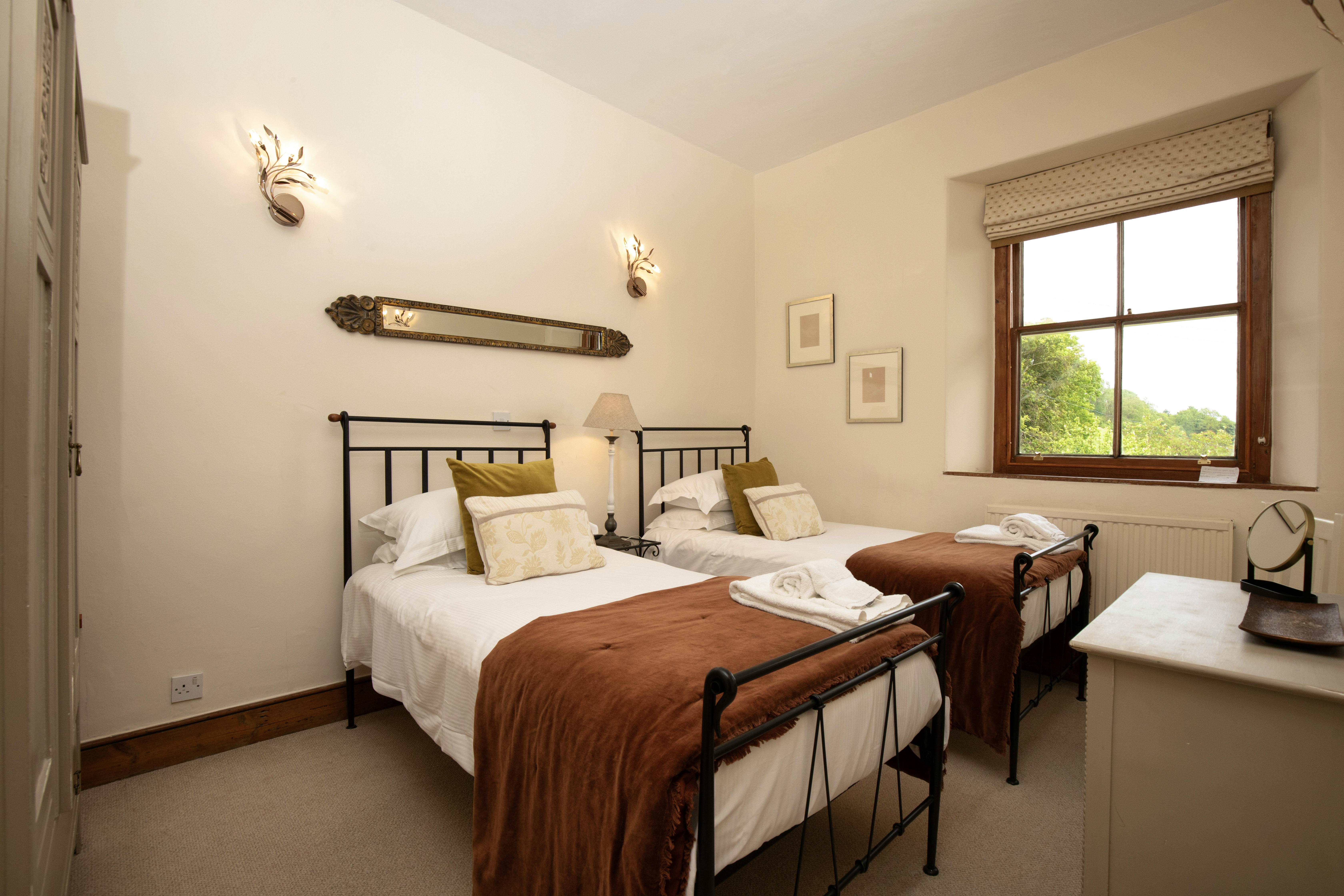 Bedroom four with twin beds