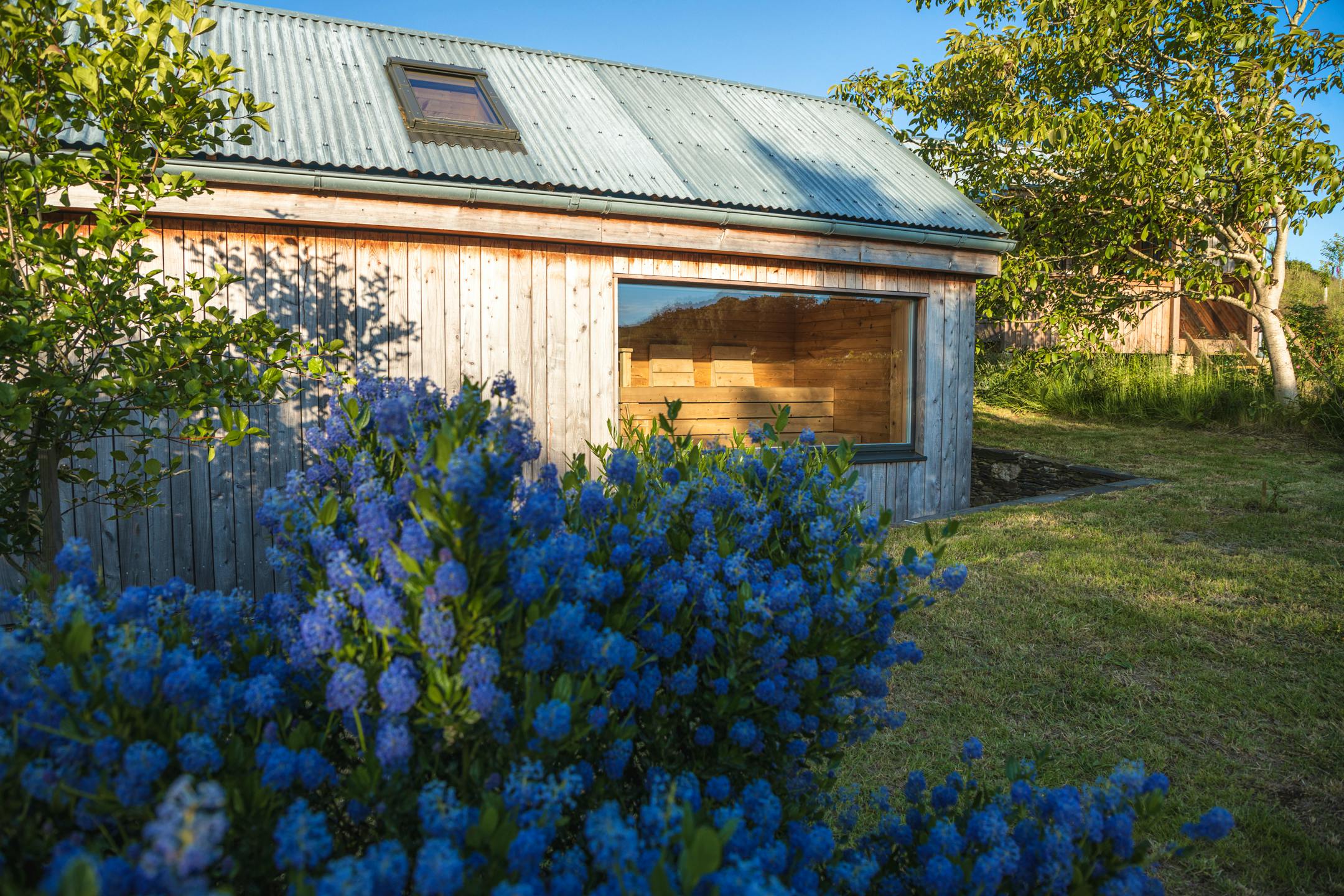 Wild sauna exterior in summer