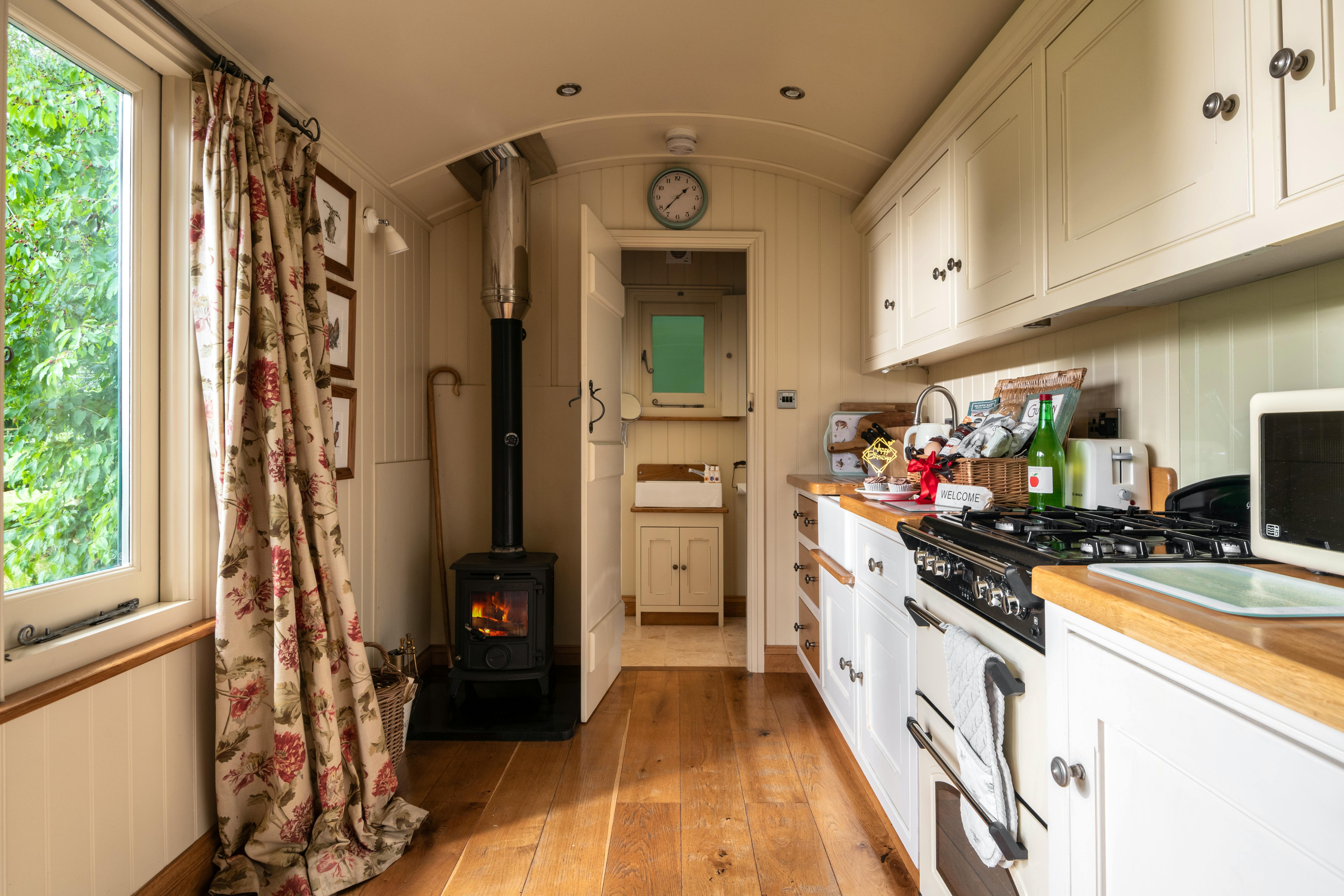 Kitchen, log burner and shower room