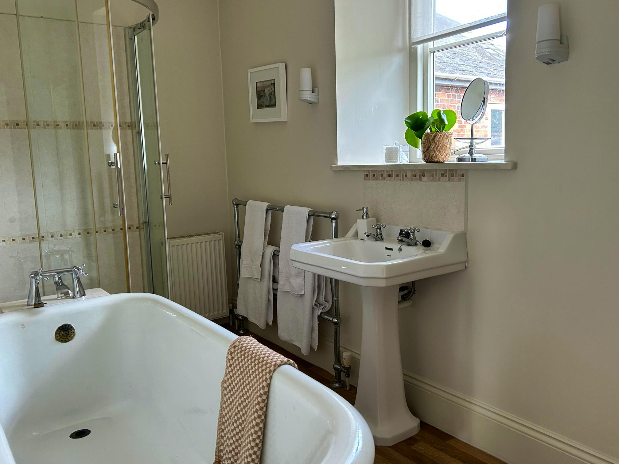 Tatiana bathroom with roll top bath