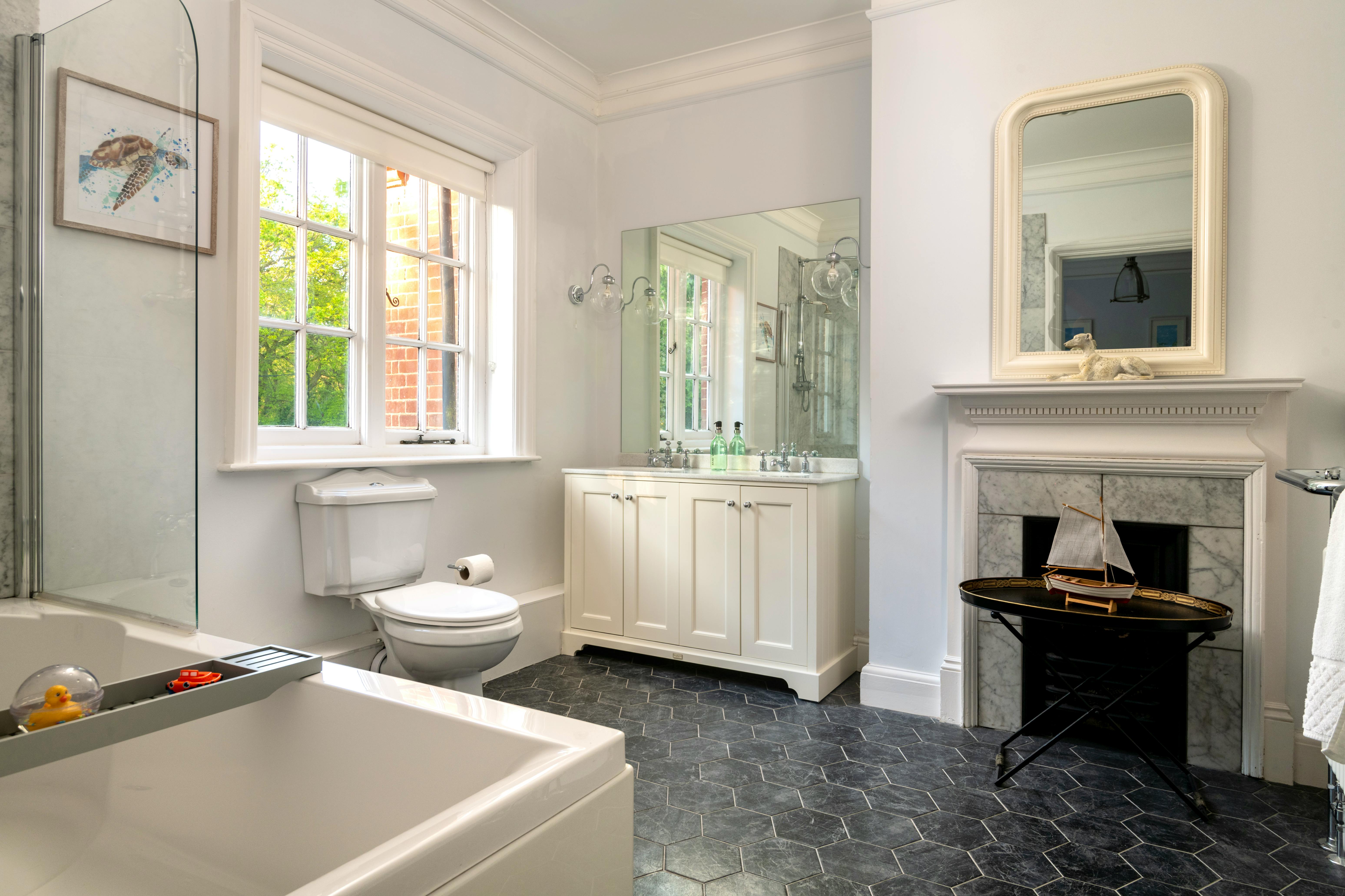 Bathroom with shower over bath