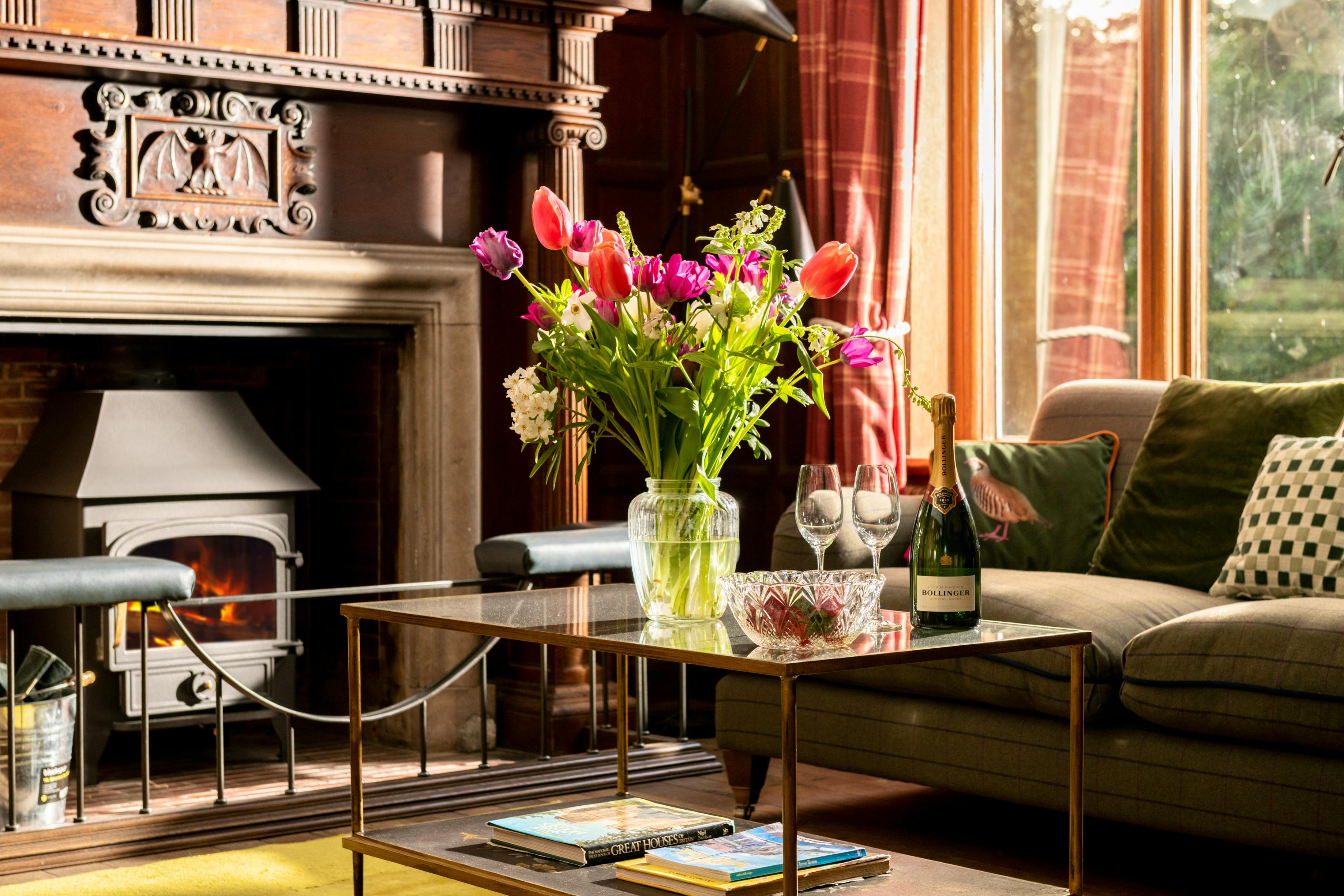 Hallway with log burner and sofas