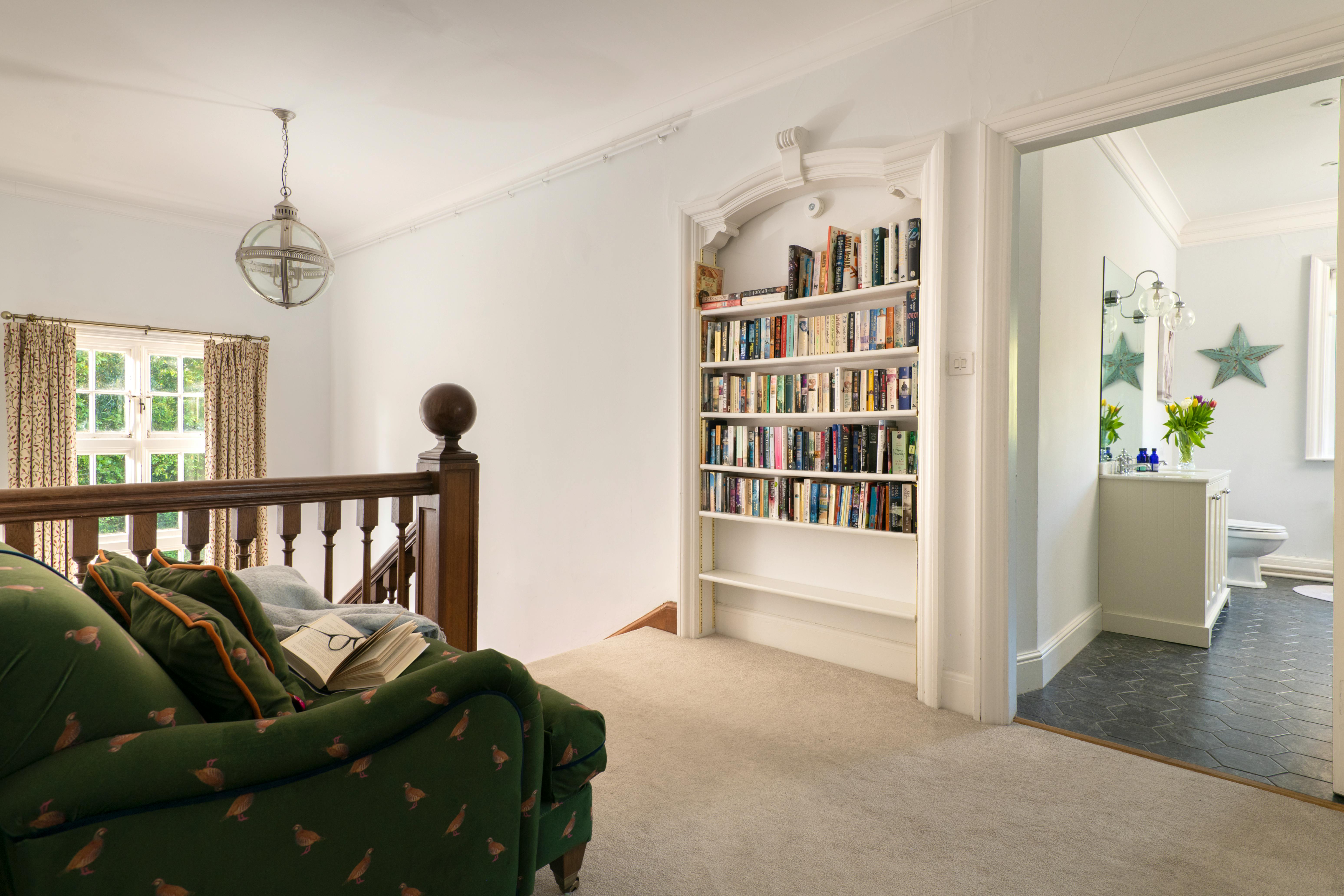 Landing with cosy chair and books
