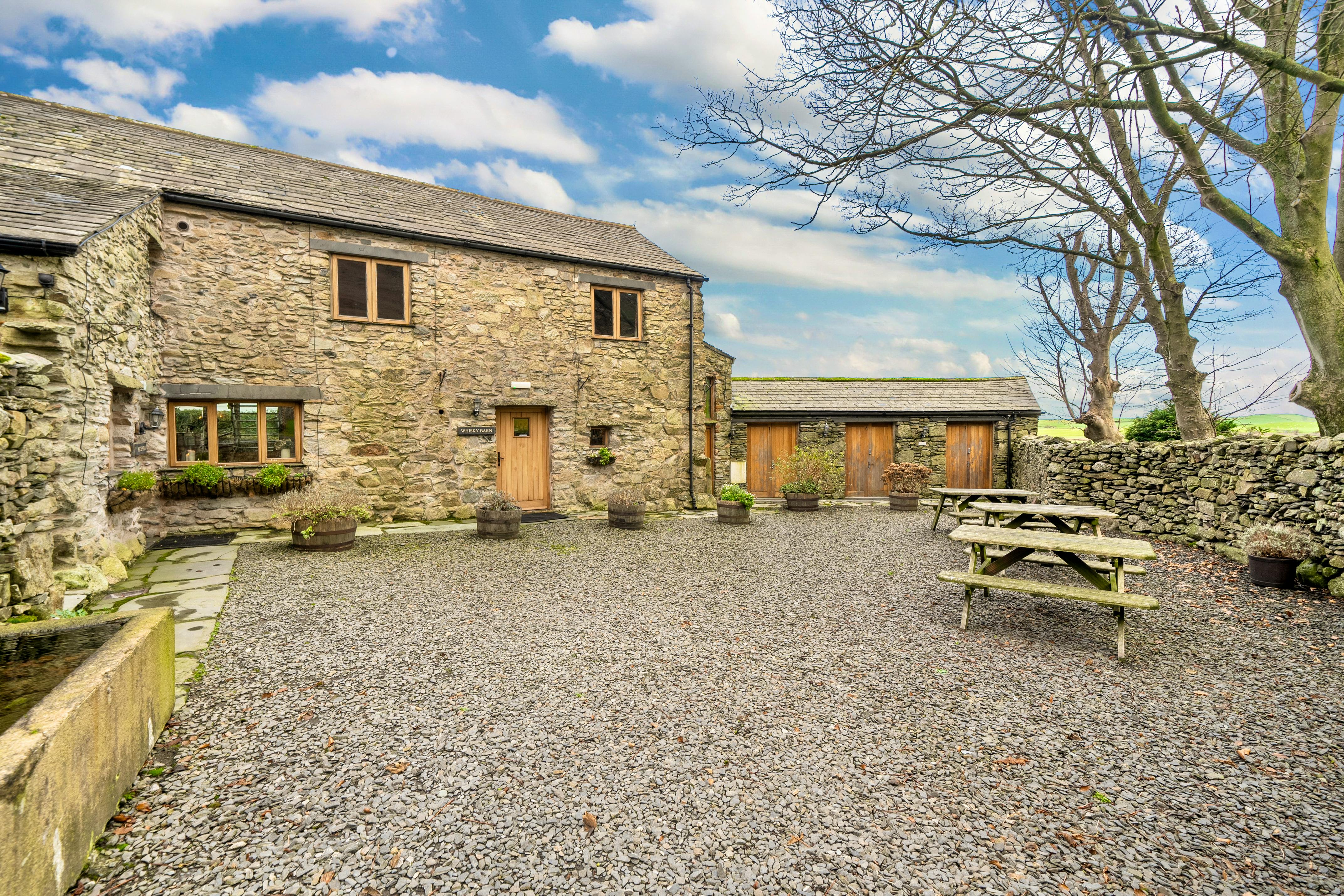 Timeless stone exterior of the barn