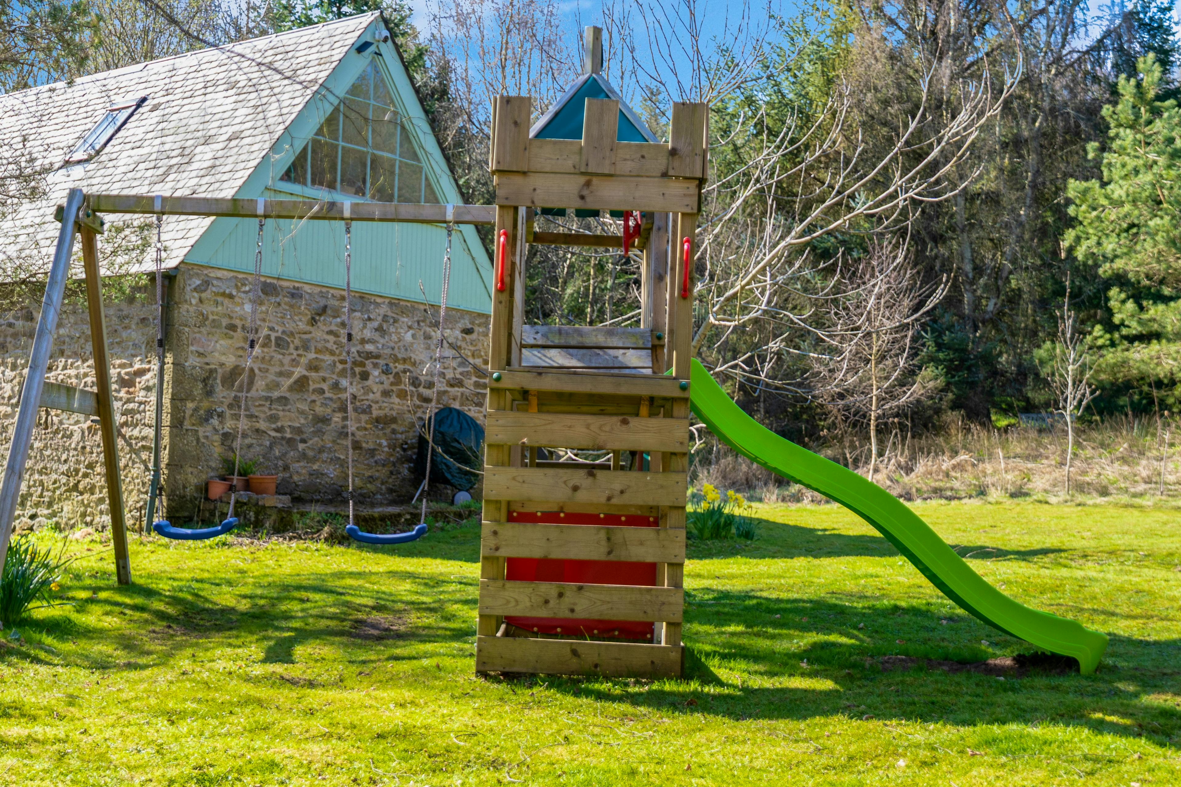 Climbing frame with swings & slide