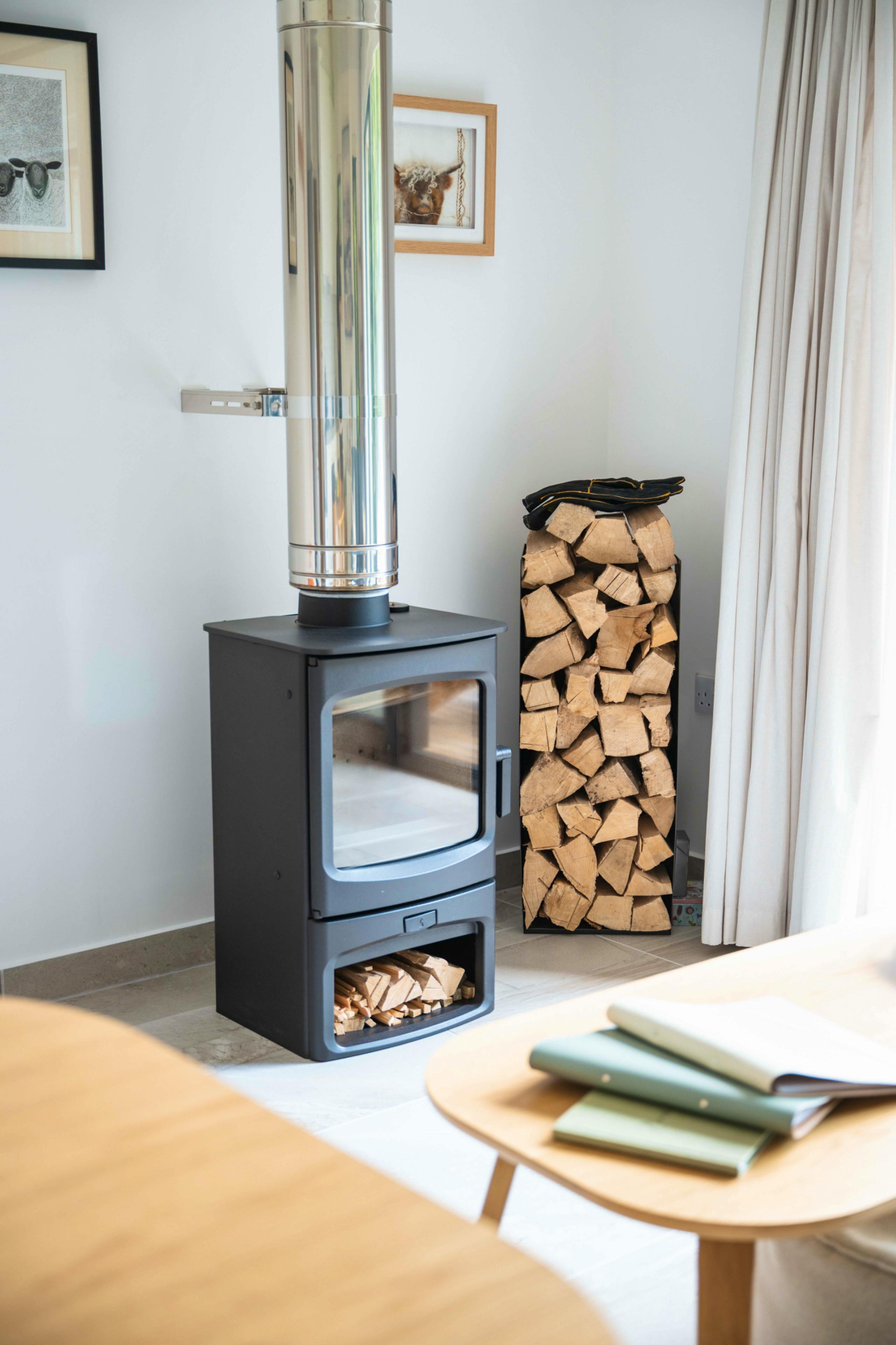 Wood stove and supply of logs