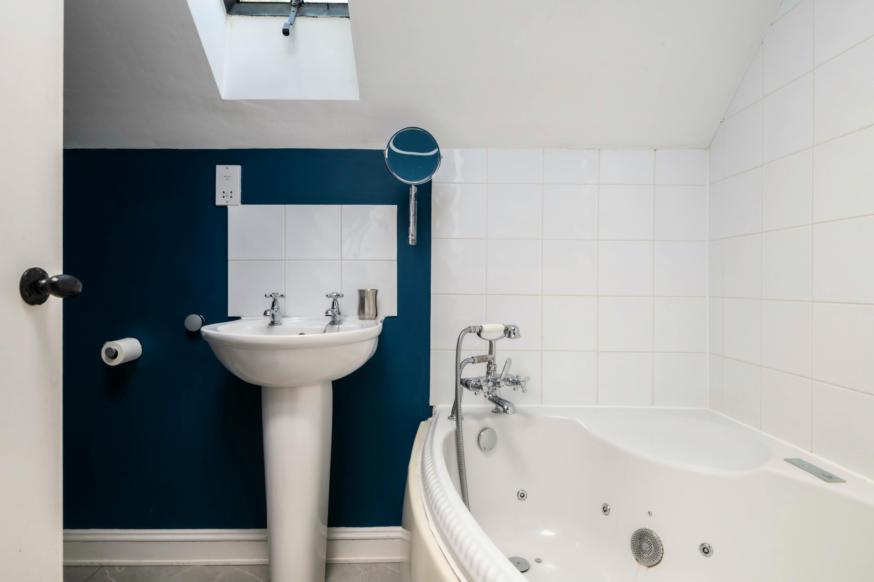 Enjoy a soak in our Corner spa bath