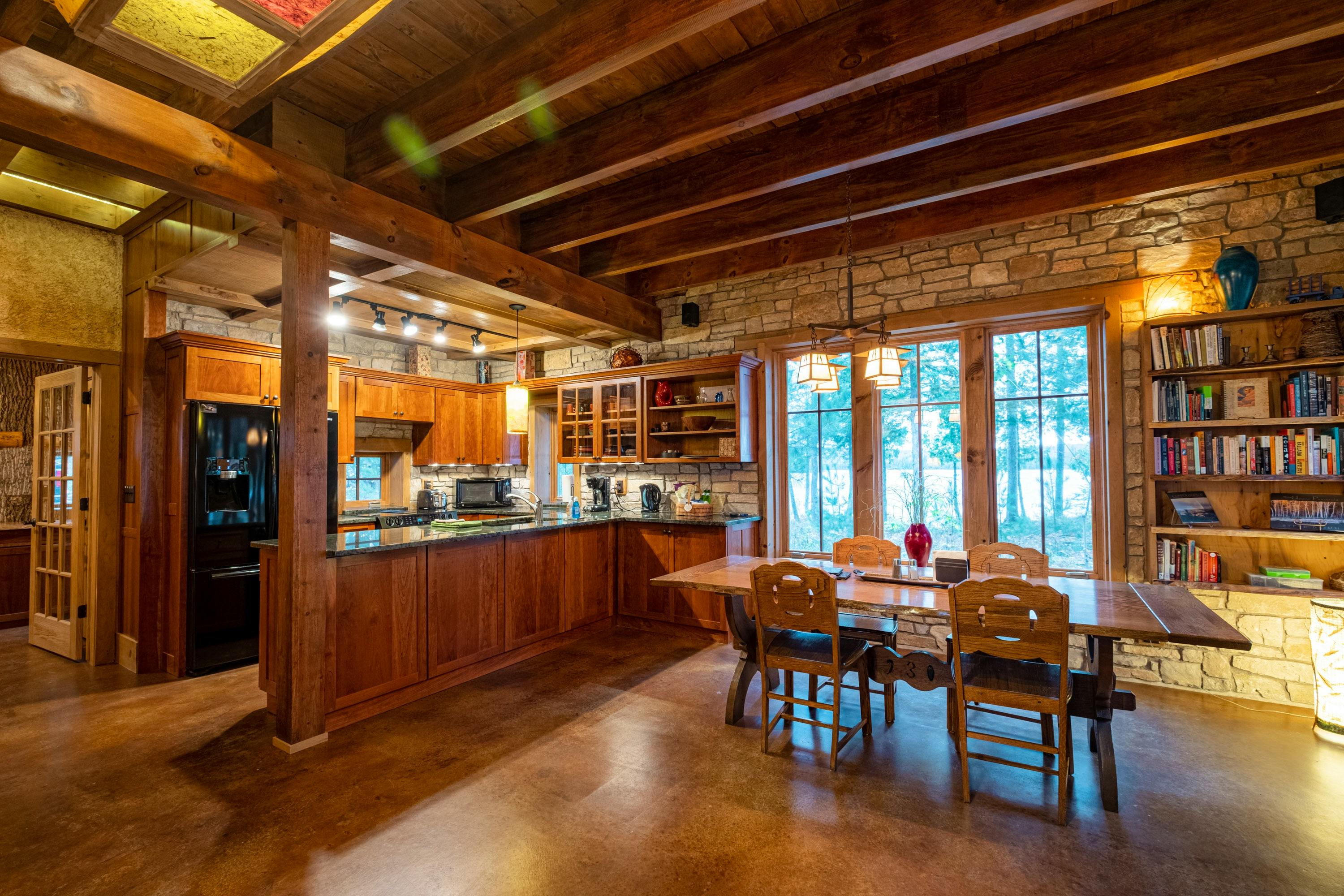 Open plan, wood and stone interior.