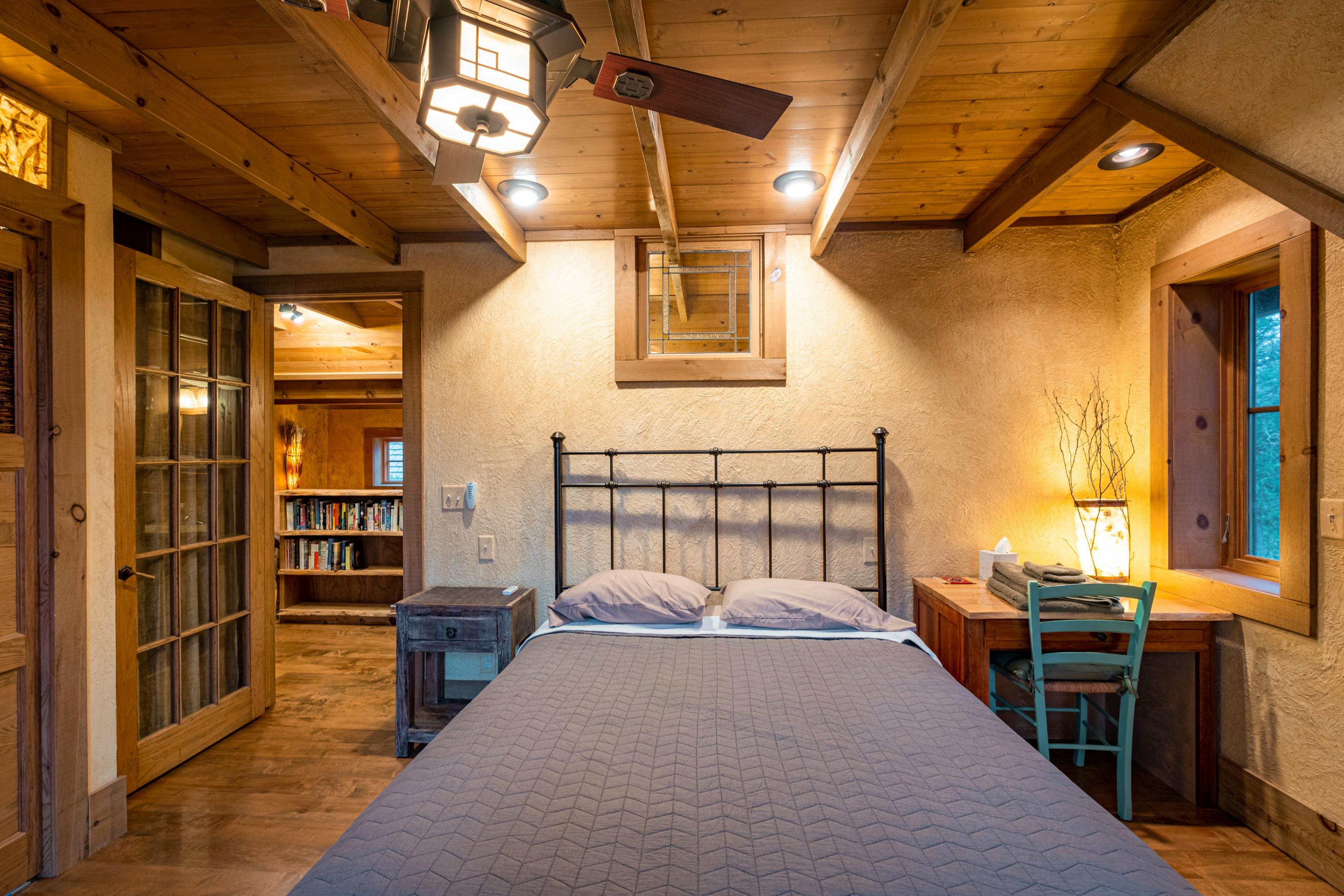 Bedroom #2 with queen bed, desk.