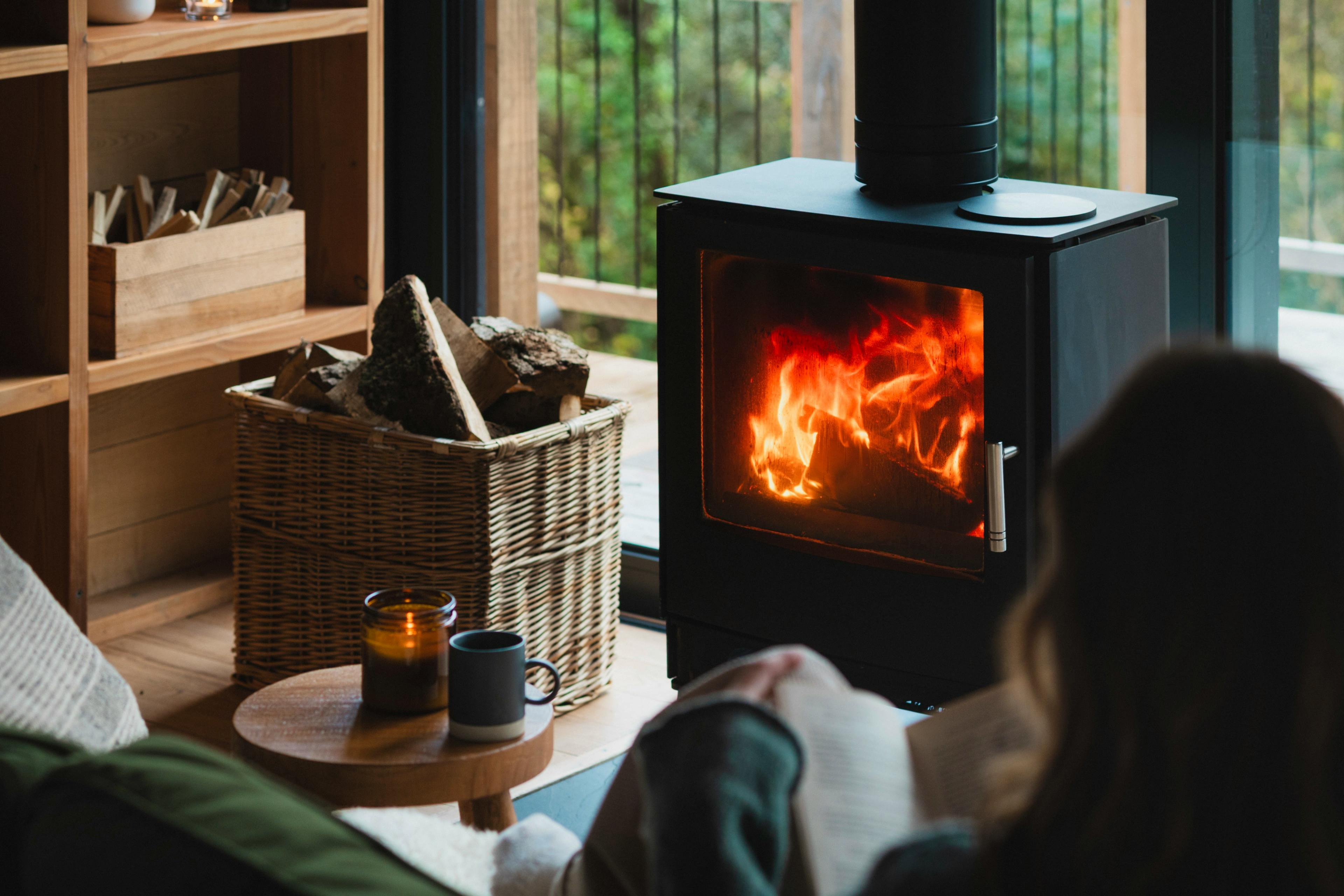 Reading by the woodburning stove