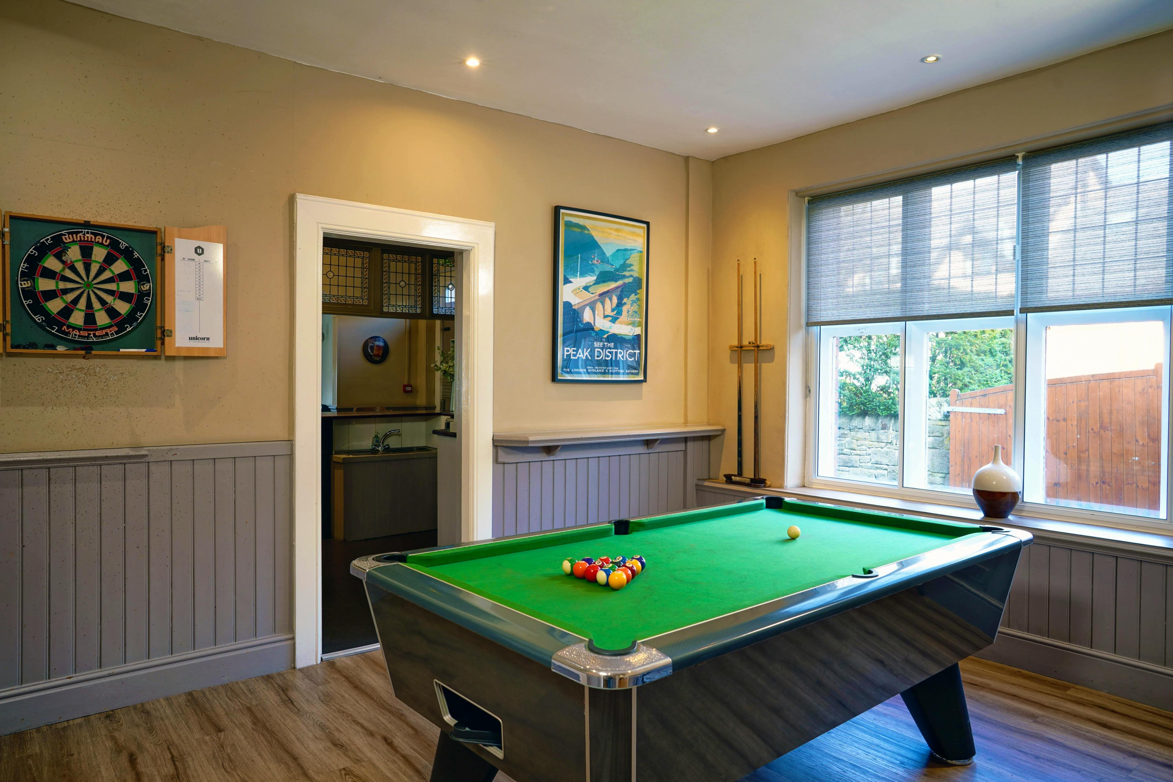 Pool table and dart board 